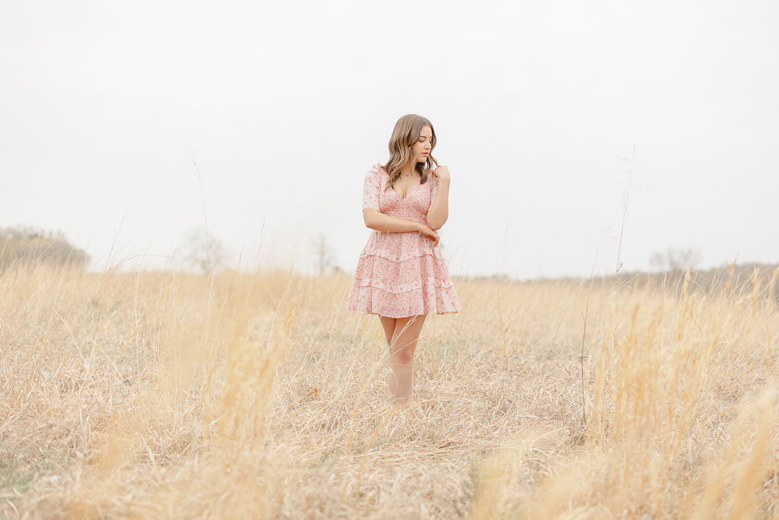 senior in the middle of a field in Marshall, VA