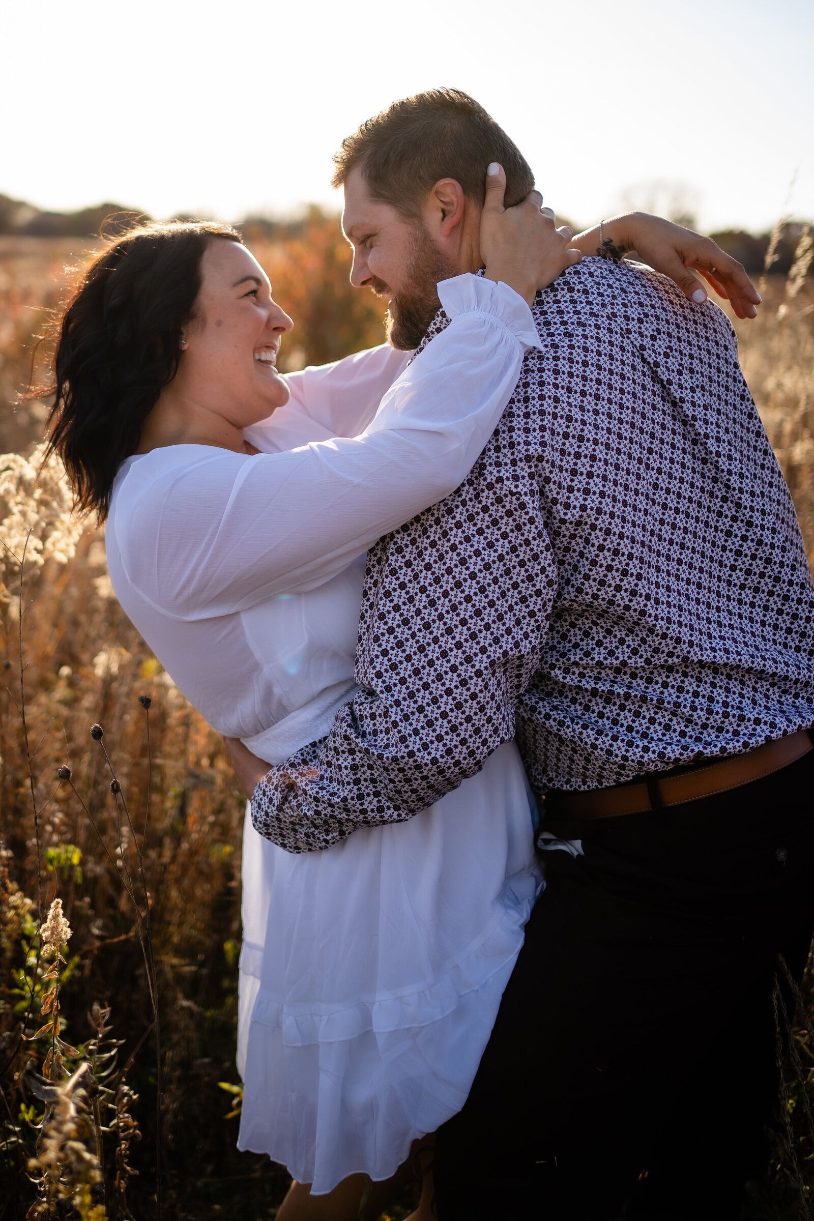 engagement photos in a field at sunset Ledges State Park Des Moines Iowa engagement wedding photographer
