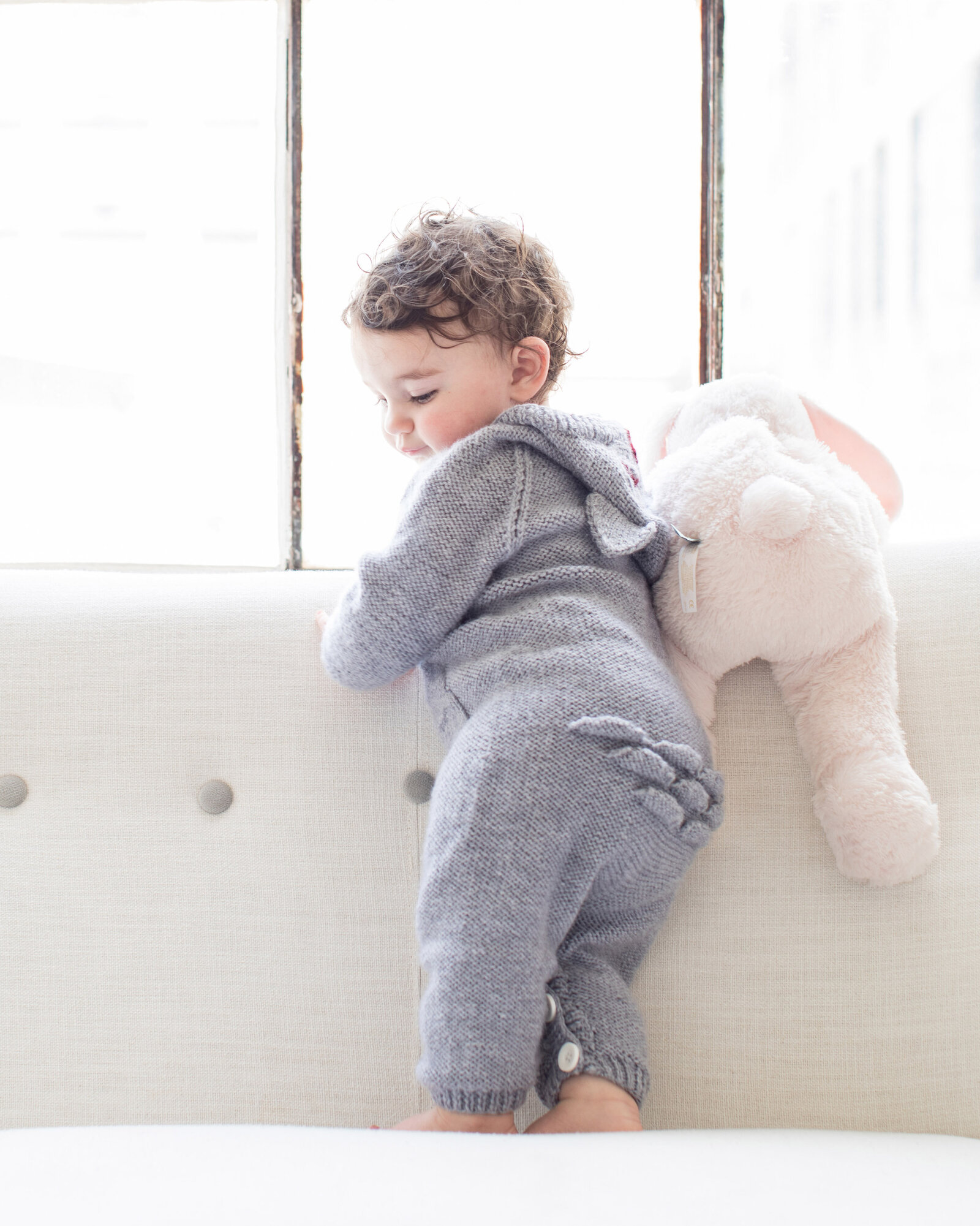 baby_girl_with_stuffed_animal