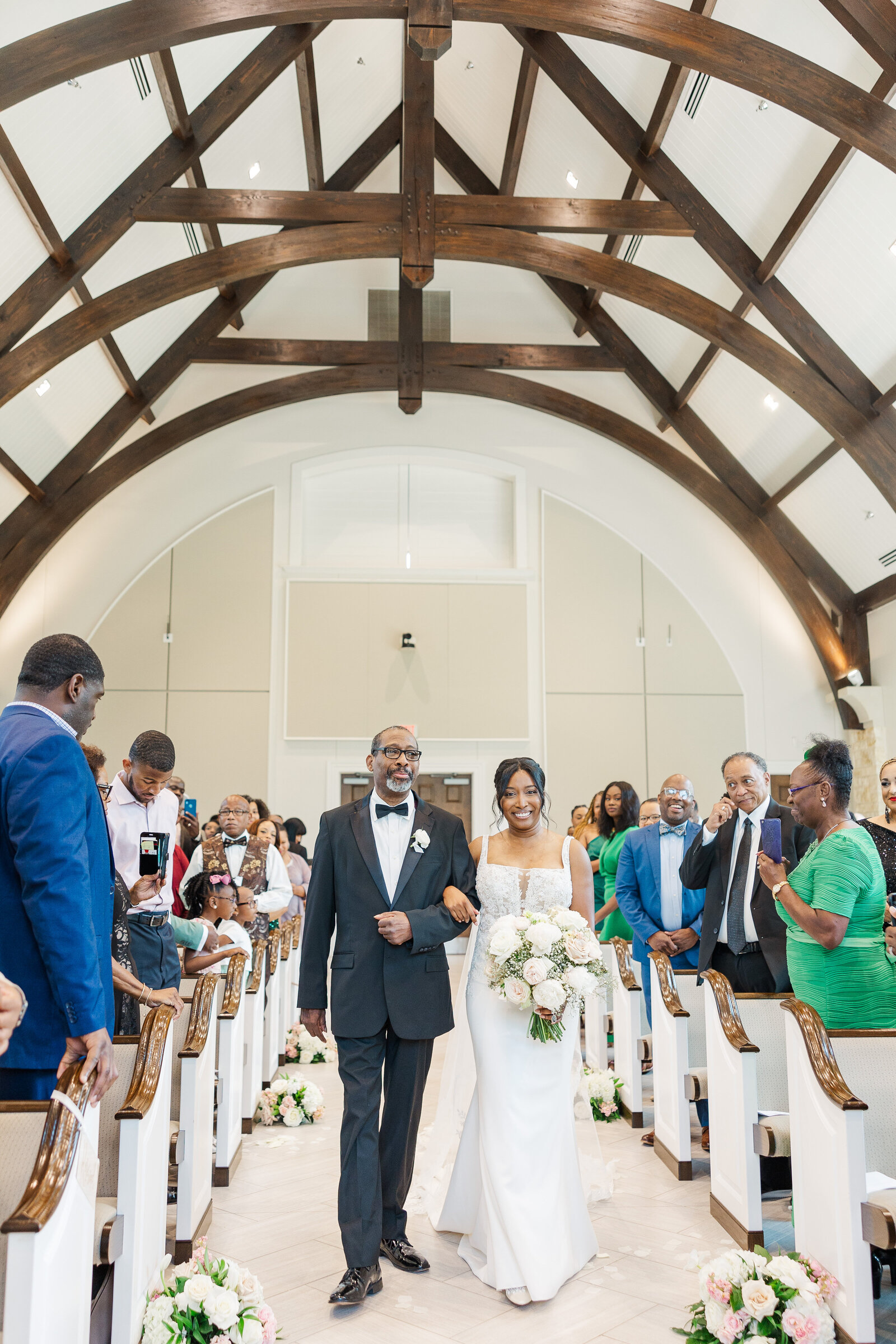 Bride-walking-down-the-aisle-with-father