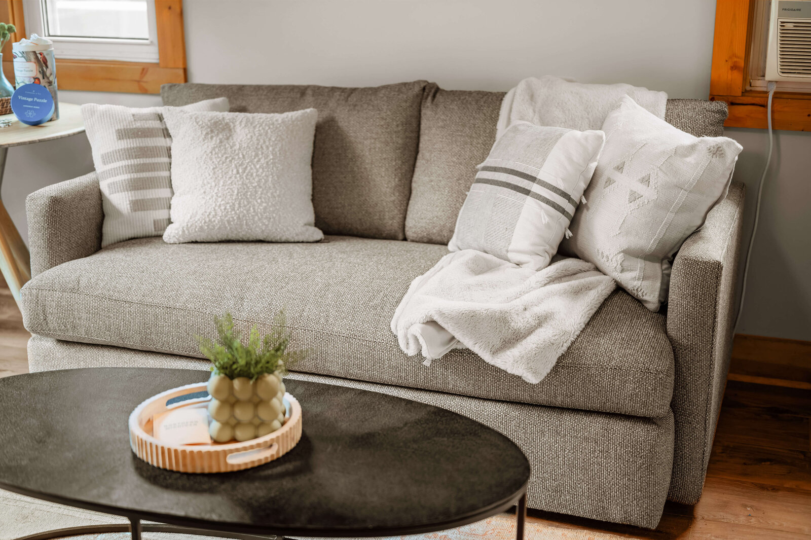 Cozy living space with gray couch