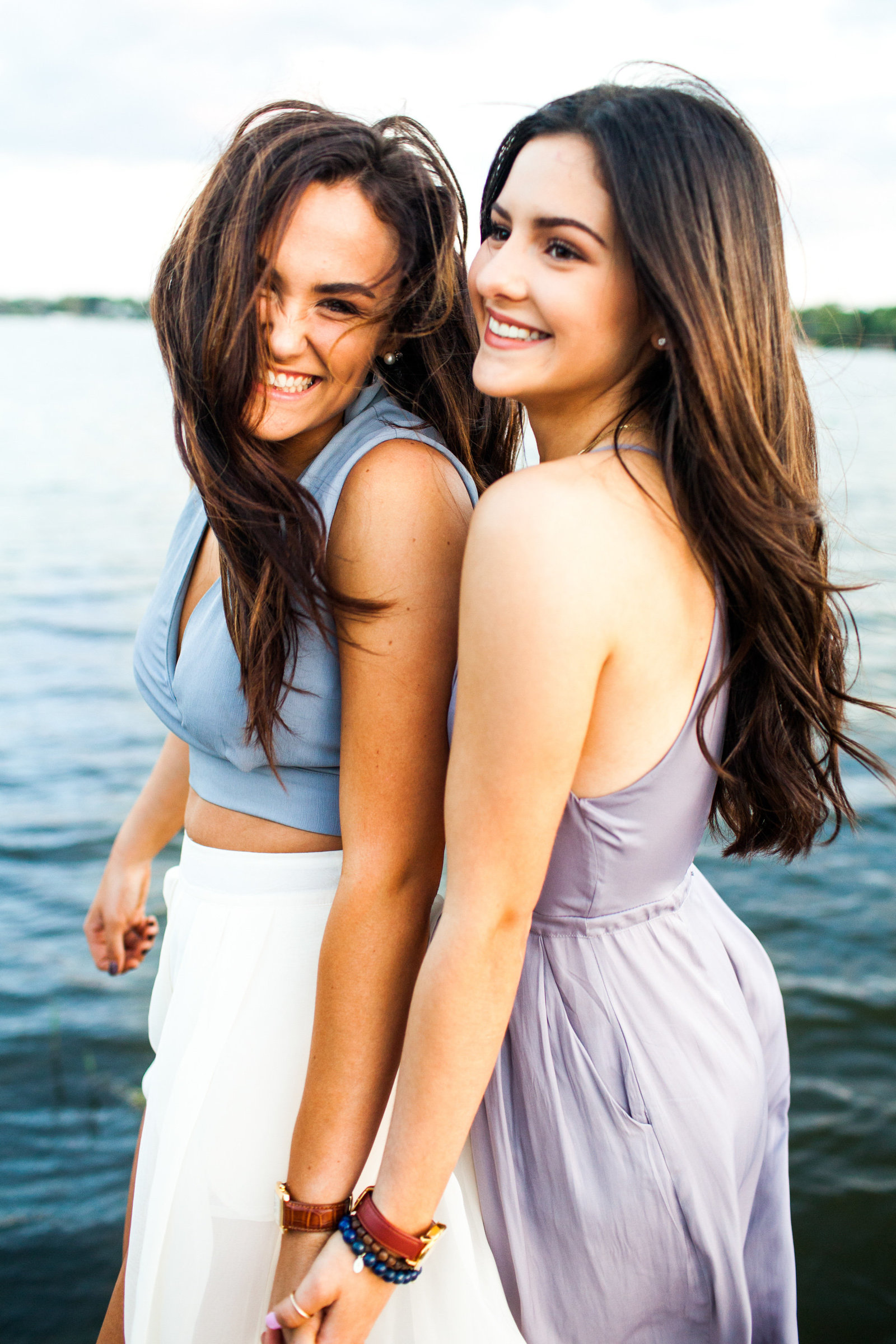 Senior portraits with your best friend by the water