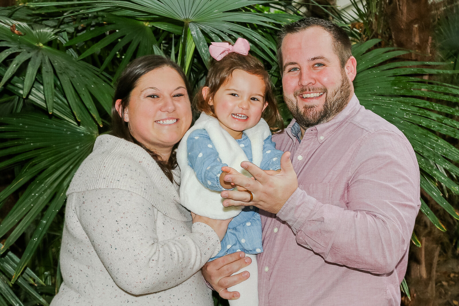 Couple with daughter at Pawleys Plantation with Ron Schroll Photography in Pawleys Island, SC