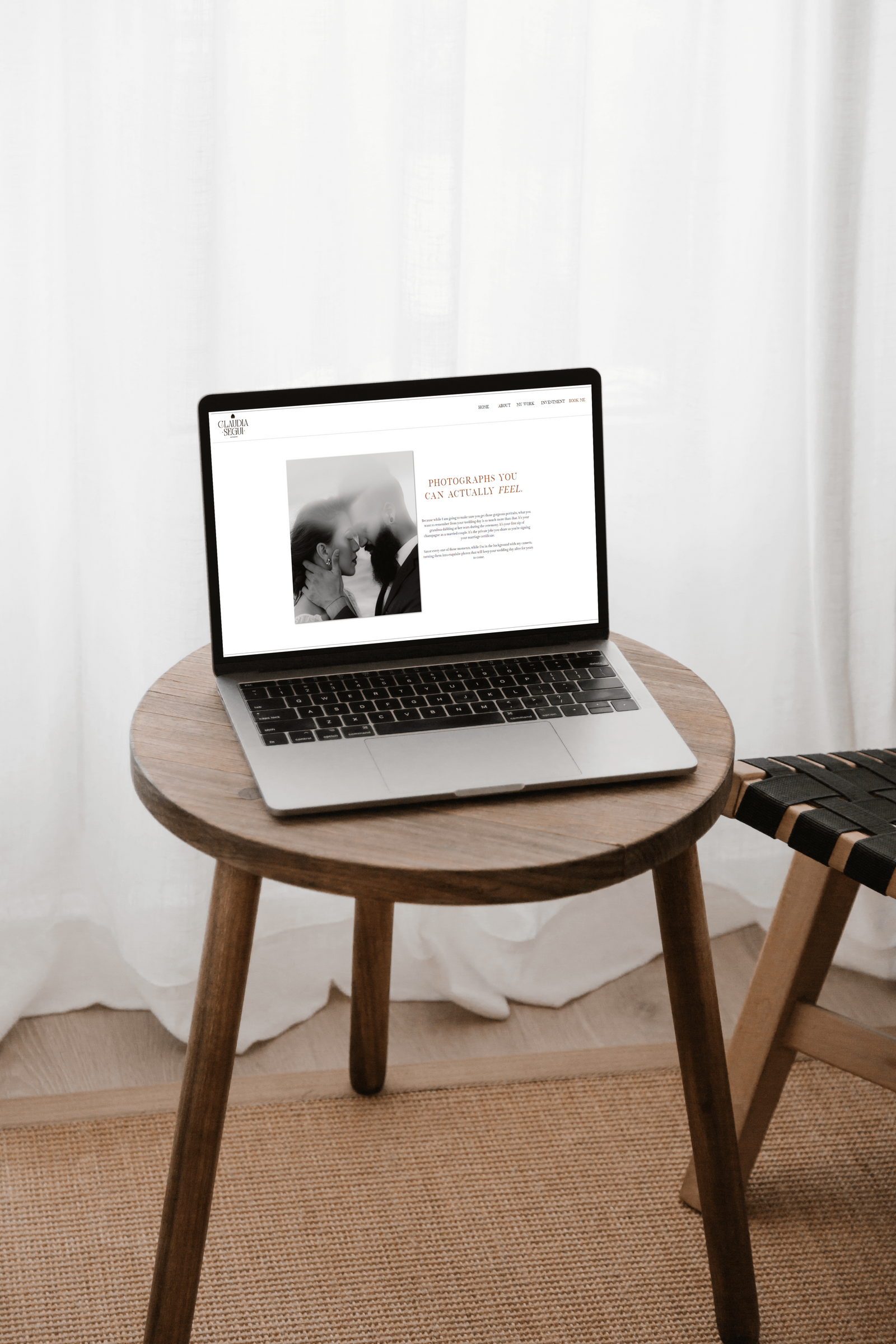 Laptop with photographers Showit website