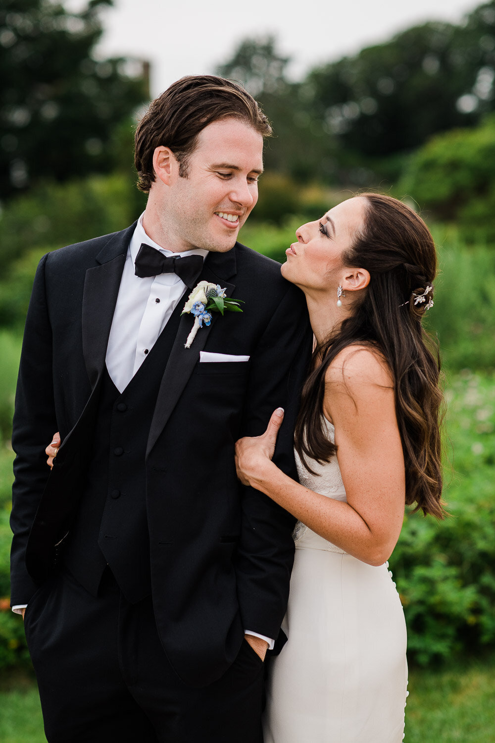 bride and groom playful hug