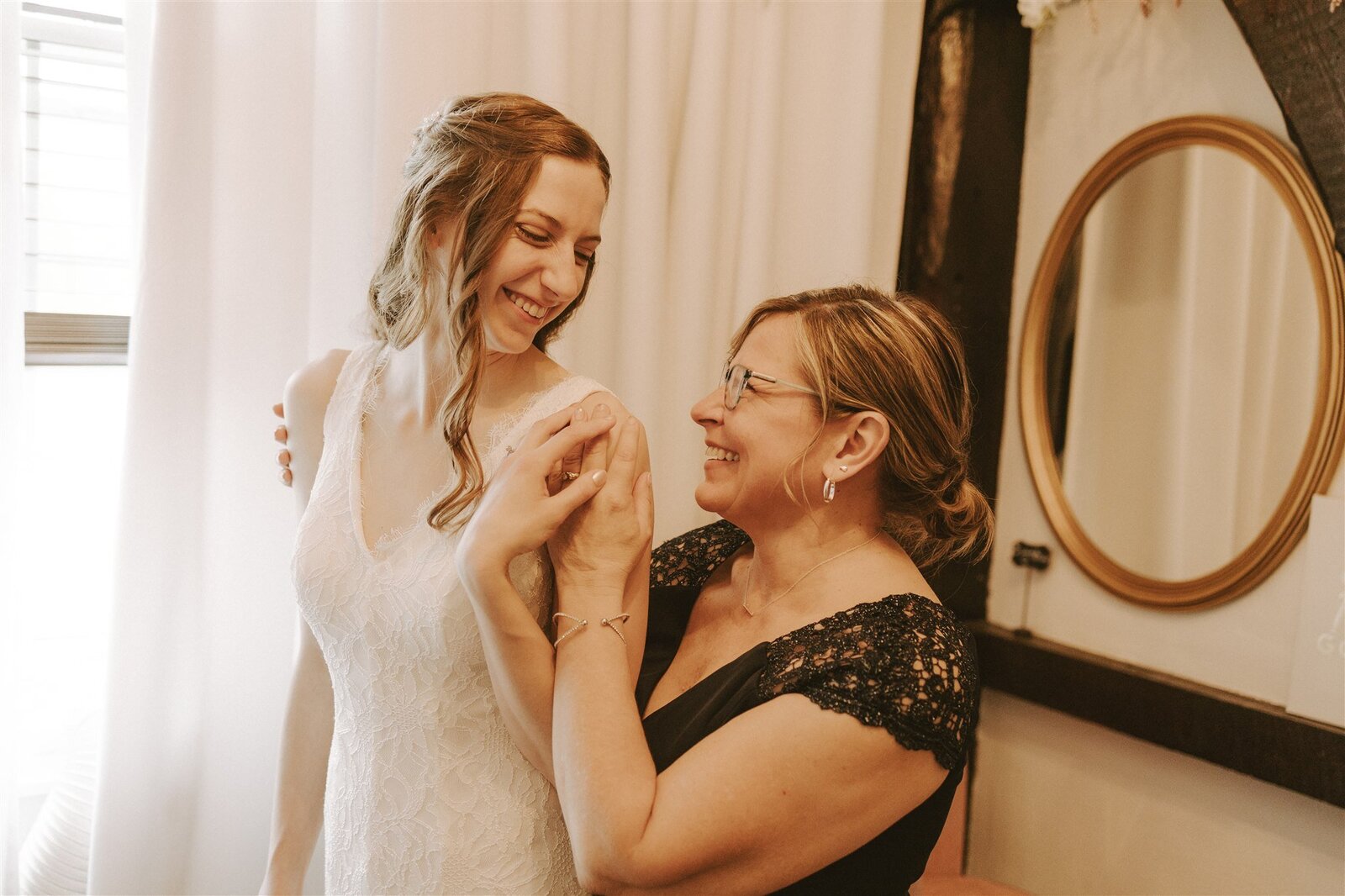bride mom smiling hugging