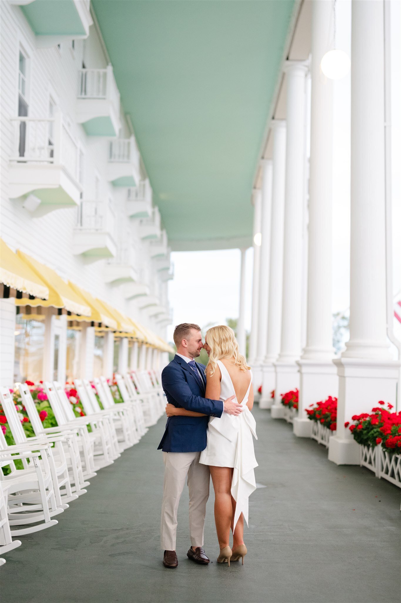 Couple kissing on the front porch of the Grand Hotel on Mackinac Island