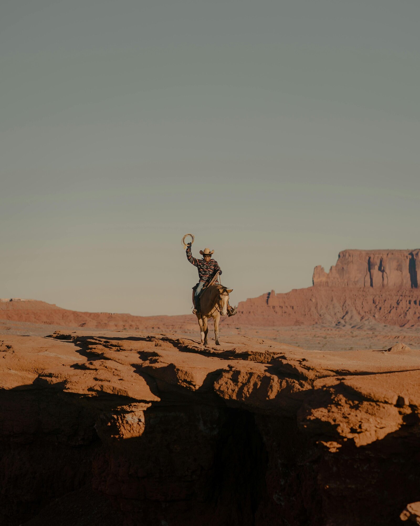 man and a horse on Arizona mountains