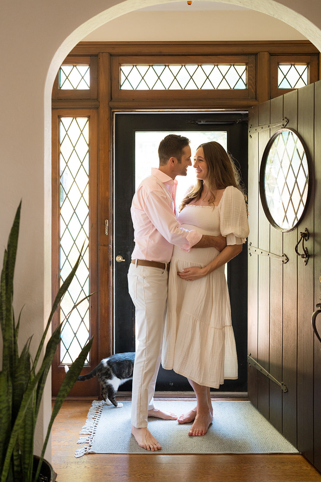 couple standign in their doorway