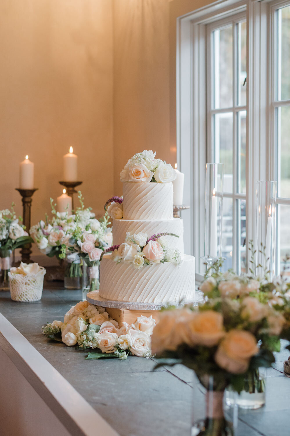White wedding cake with flowers