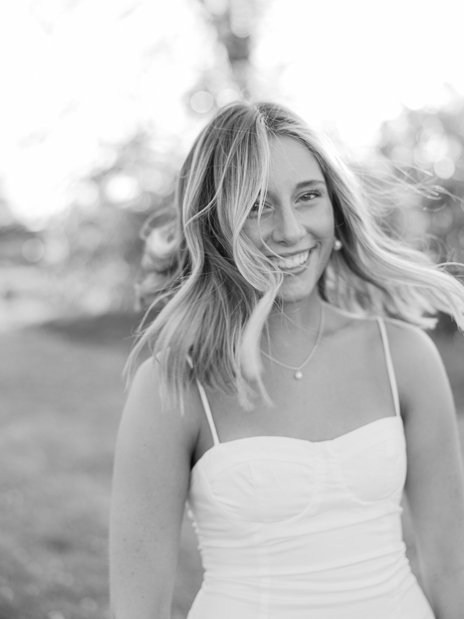 Senior photographer Alabama college outdoor natural light.