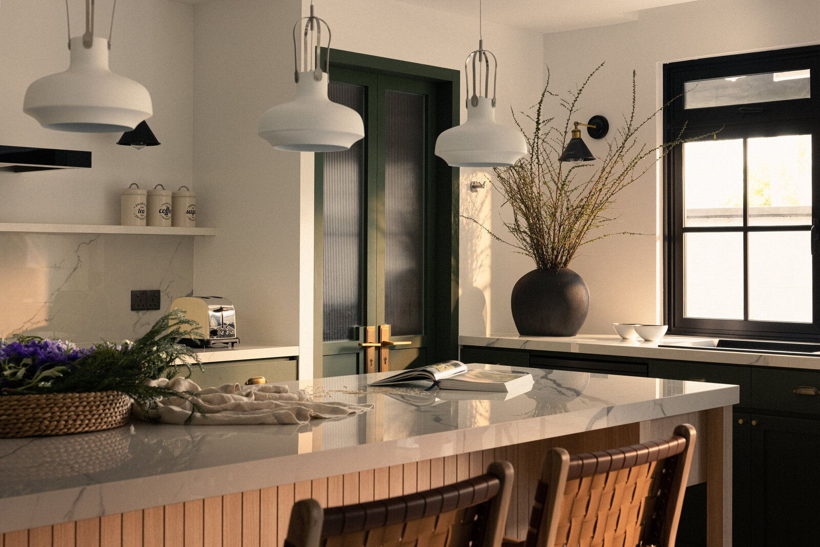 wide view of a kitchen with island and island stools