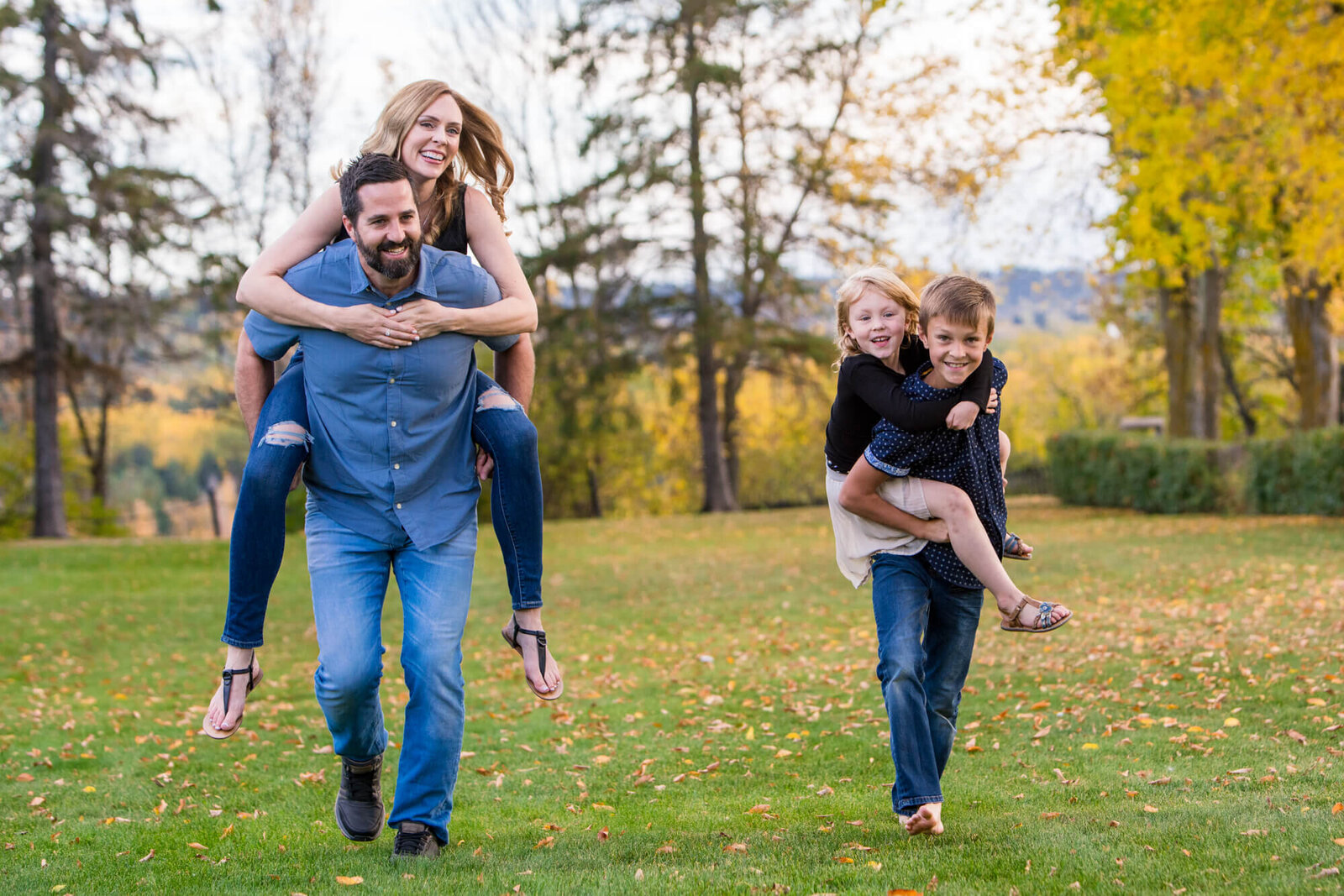 Family of 4  piggy back race