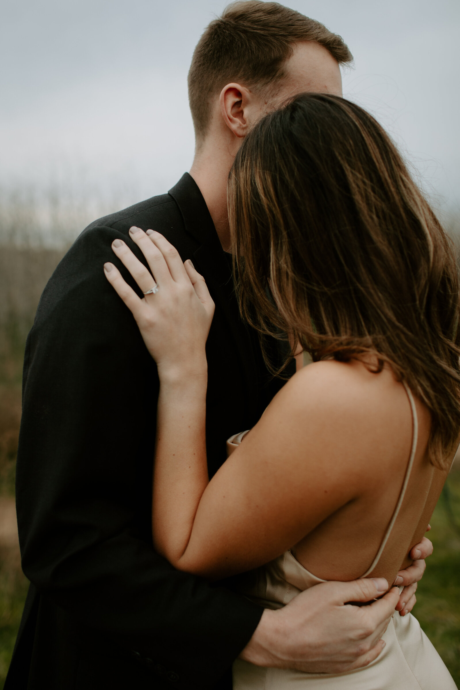 couple holding each other during engagement session
