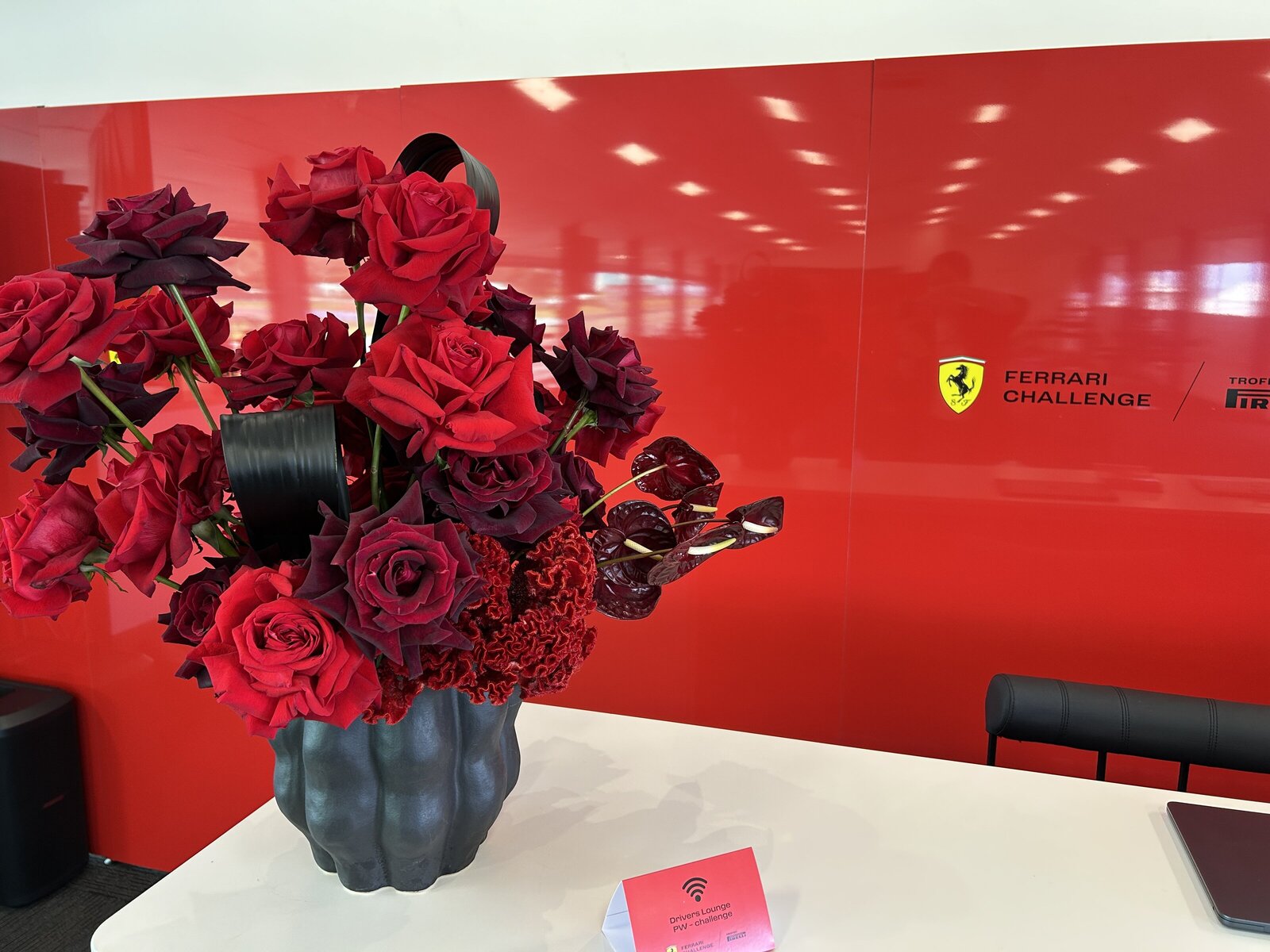 large luxe rose arrangement for Ferrari corporate event at Phillip Island Grand Prix Circuit