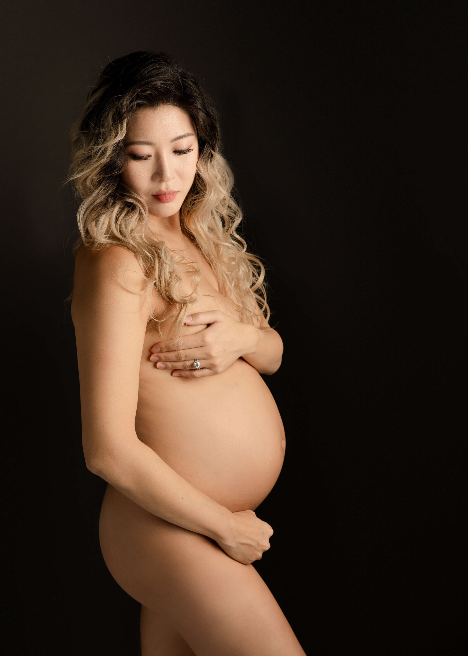 Mom posed in studio nude by Ashley Nicole Photography