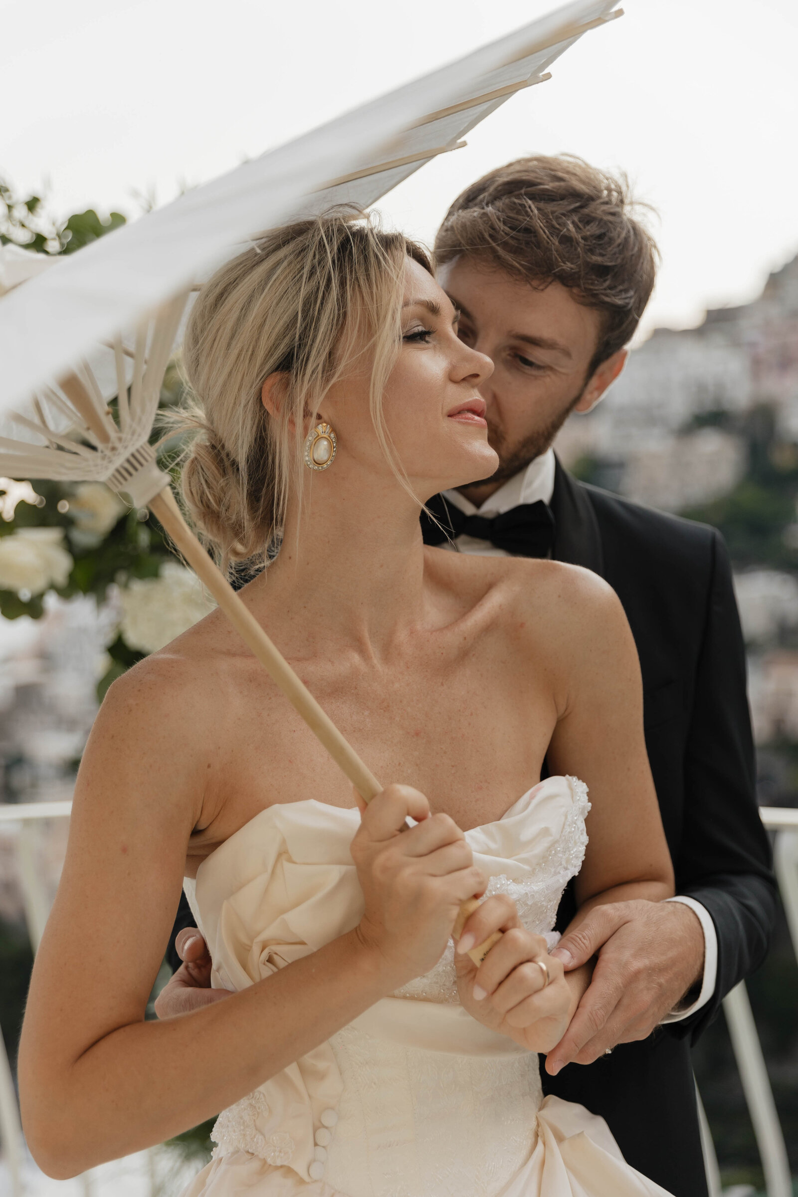 Couple elopes in Italy, with an elopement photographer capturing their intimate ceremony in a mediterranean setting.