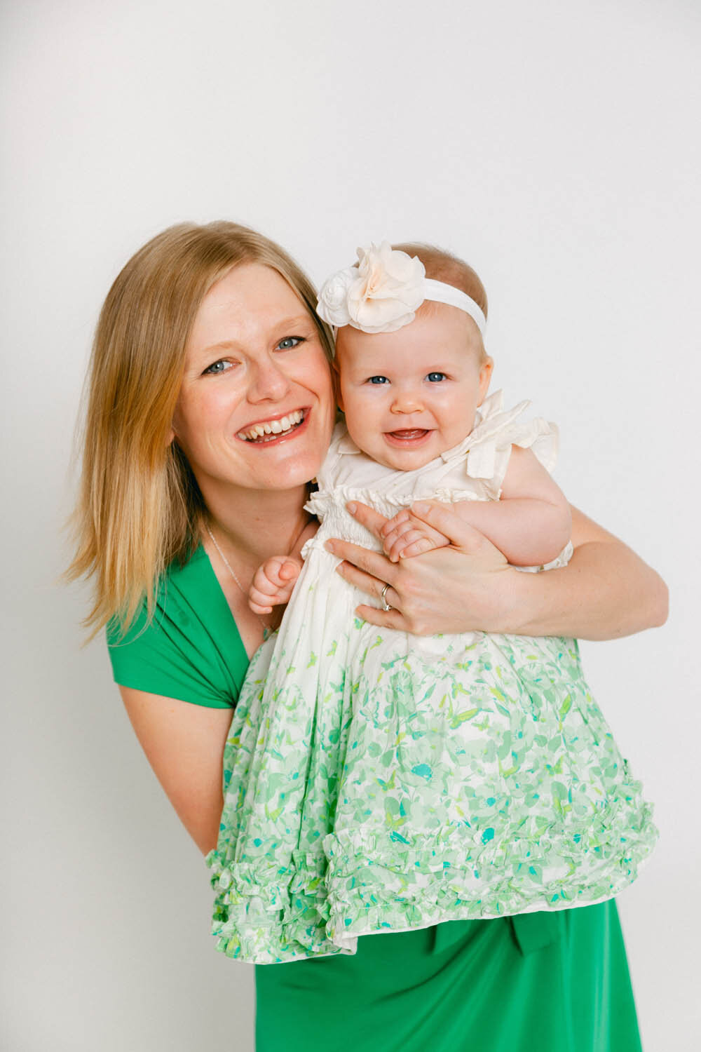 A mother and baby portrait in a studio