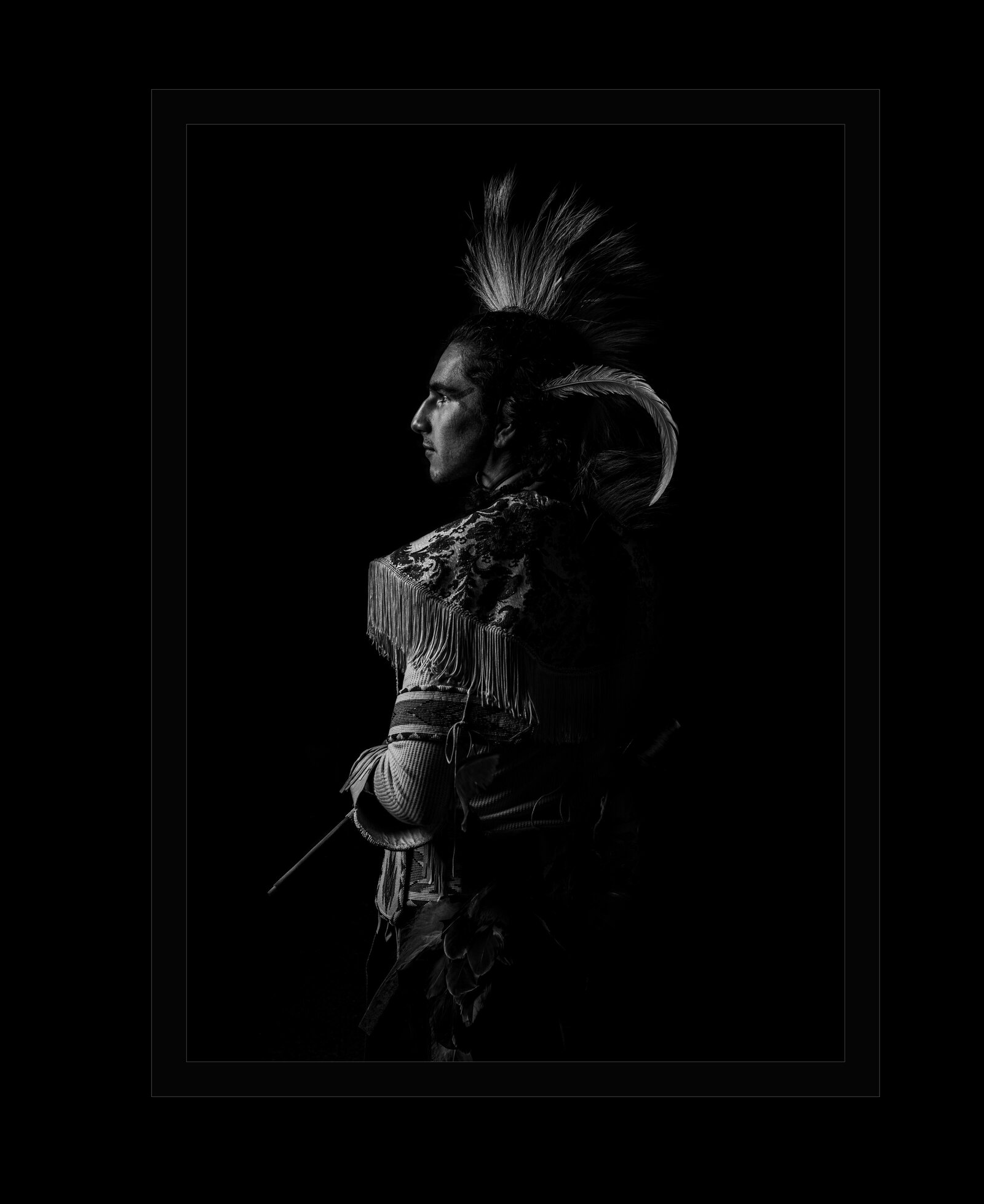 Native American black and white photo wearing his family regalia