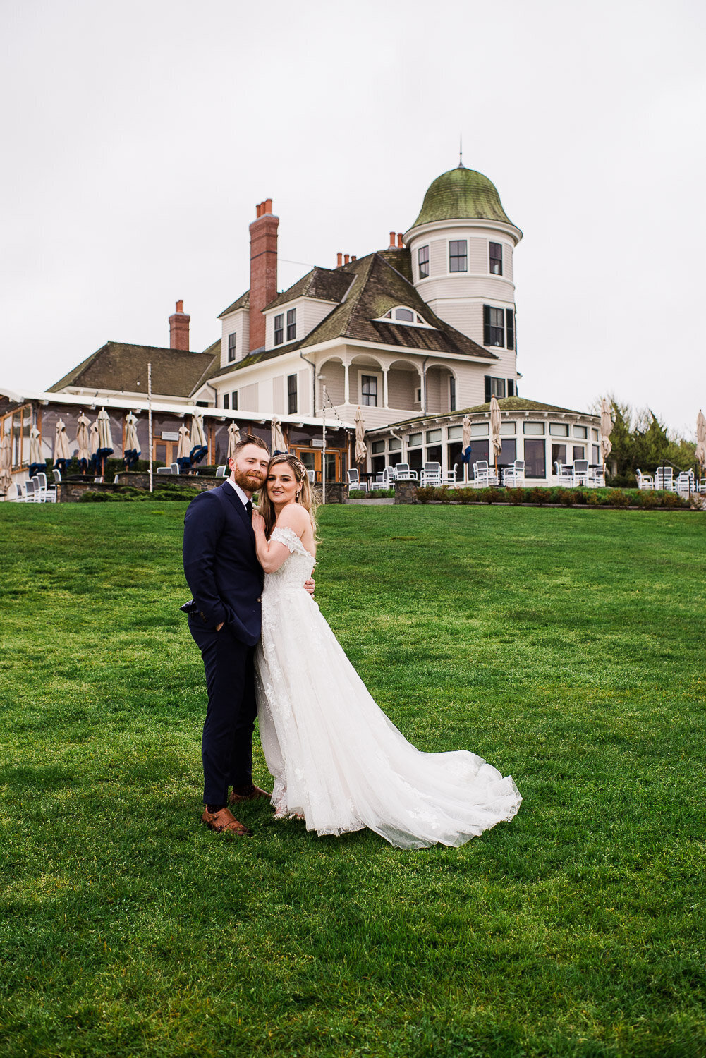 bride and groom portrait in front of Castle Hill