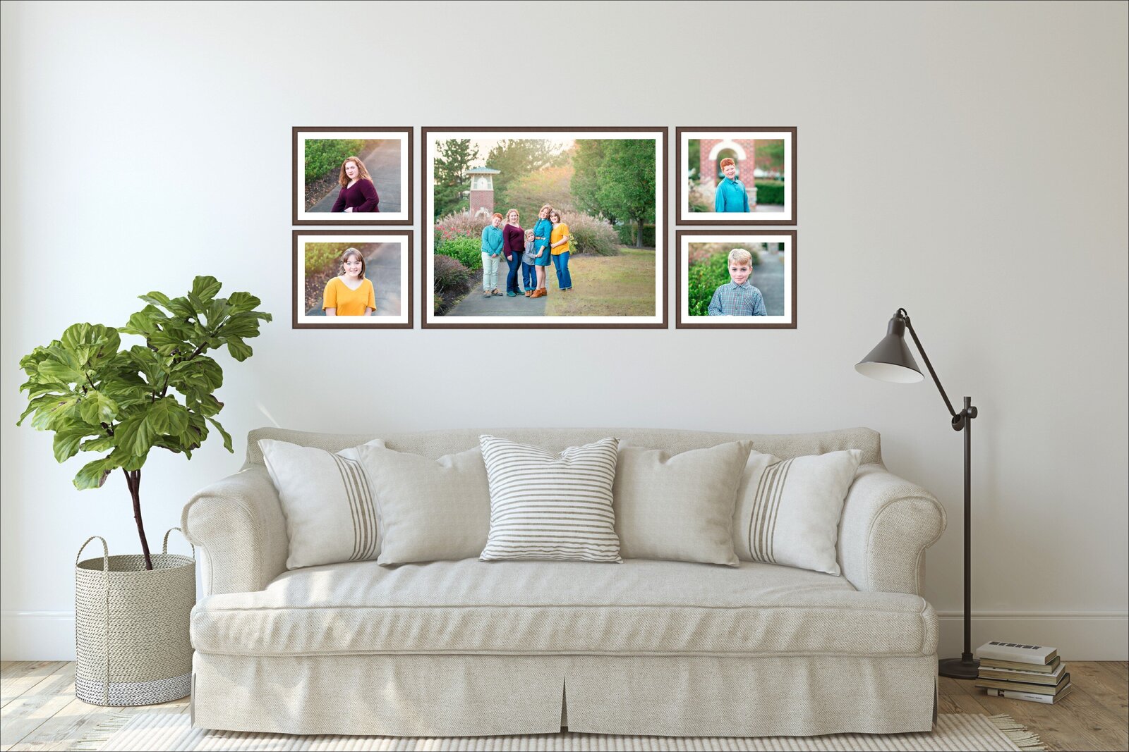 Family photo prints in a collage above a couch for a modern family living room design