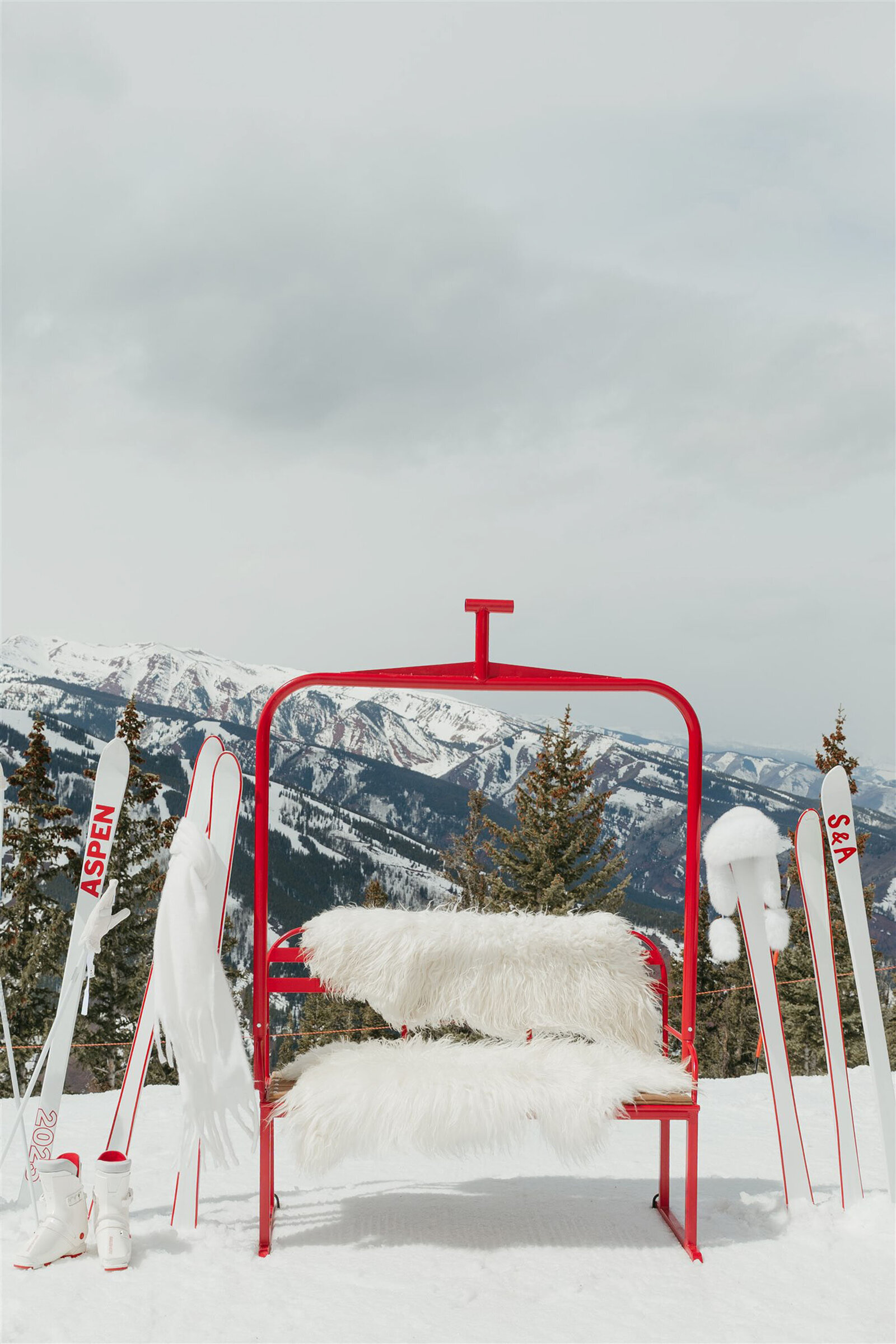 Stylish bride and groom at multi-day Aspen wedding with upscale decor and alpine scenery