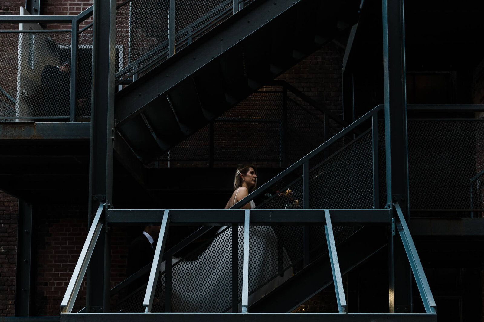 Moody wedding photo of bride downtown Halifax, photographed by Rachael Shrum.