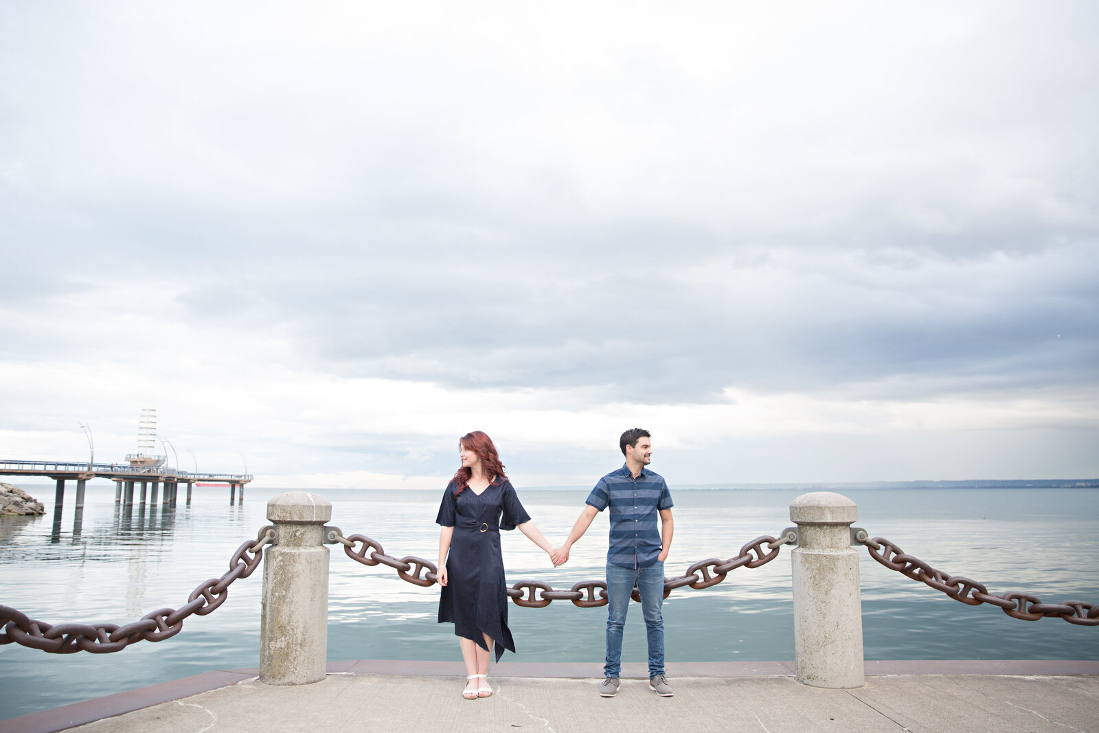 engaged couple at Burlington pier waterfront