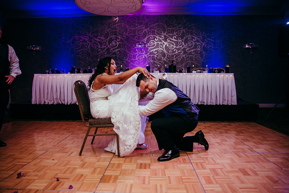 bride and groom garter toss