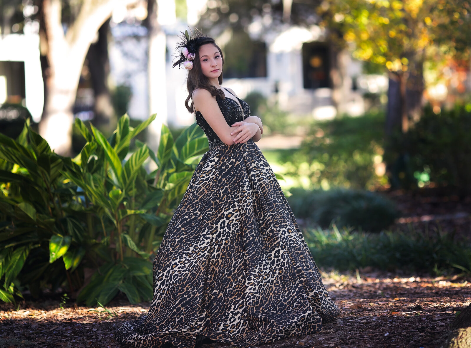 Savannah Boudoir Photography and Glamour showcases gorgeous brunette girl dancer in designer animal print gown at Forsyth park