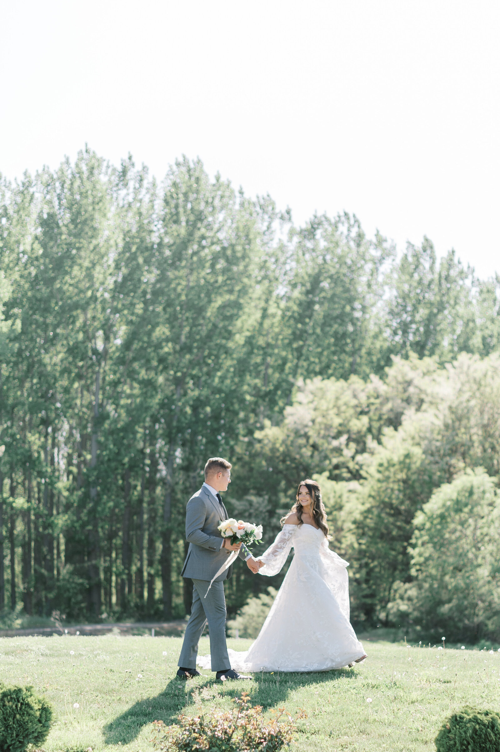 Chateau Des Fleurs Wedding in Boise Idaho bride and groom walking the grounds