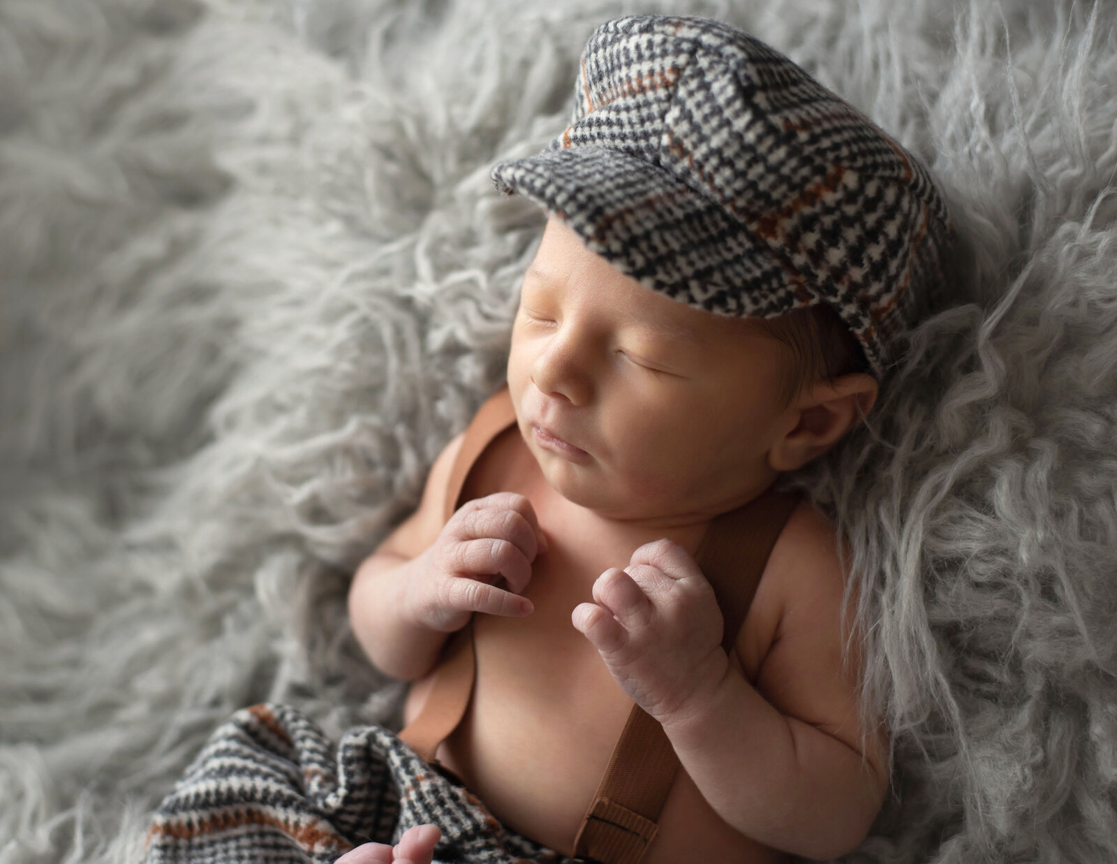 grey neutral baby in hat photography