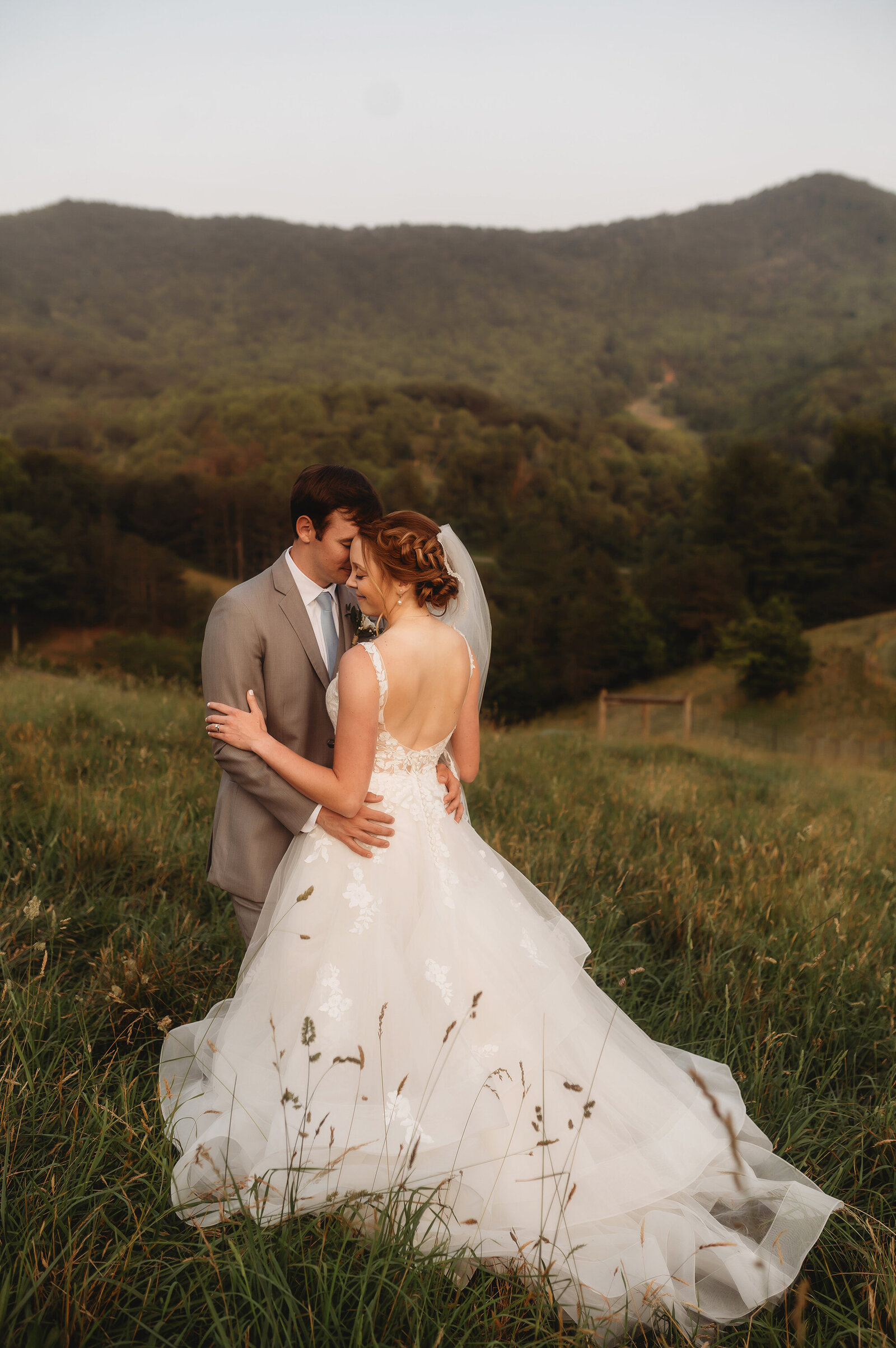 Newlyweds pose for Wedding Photos at Chestnut Ridge Events in Asheville, NC.