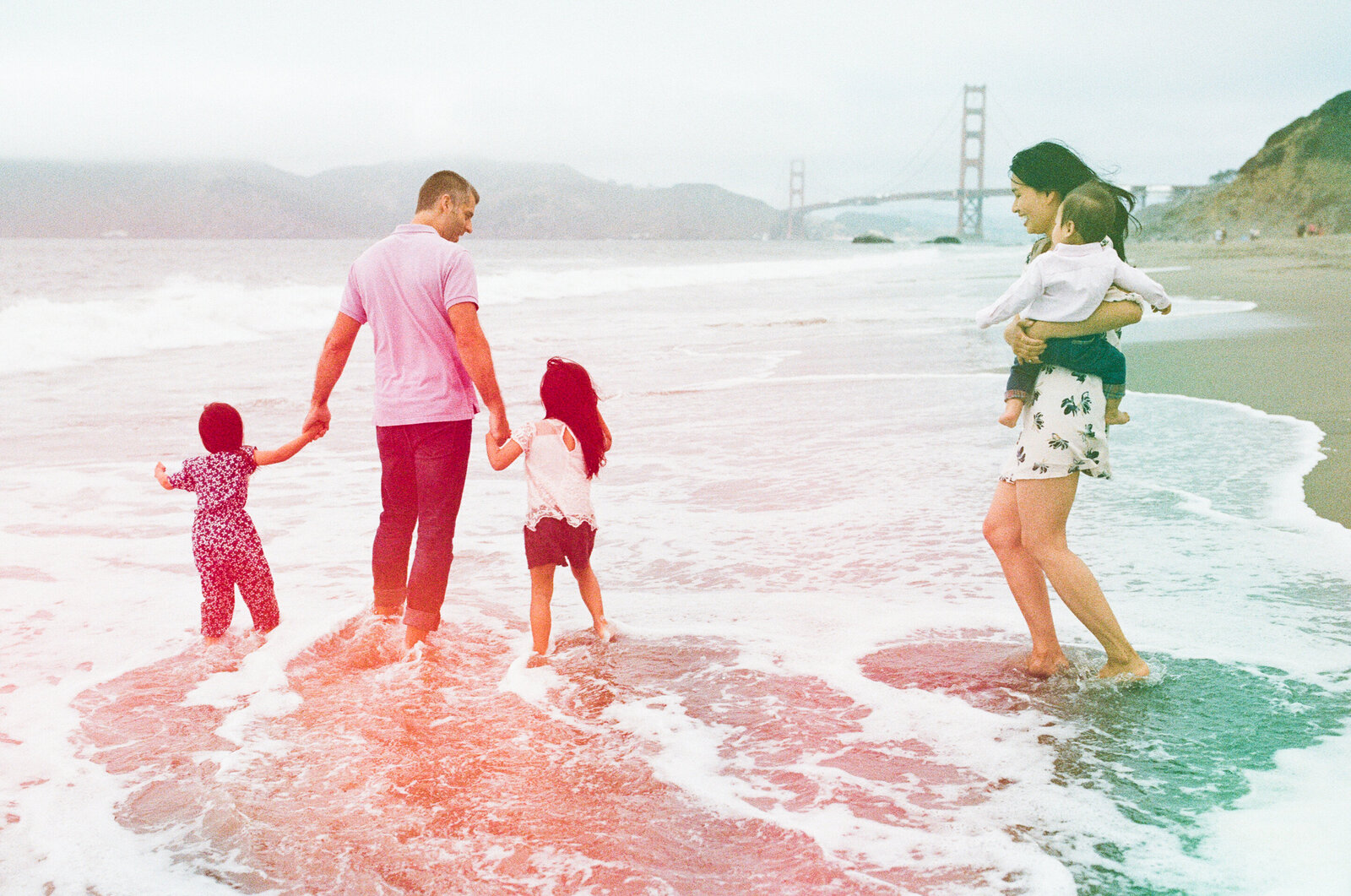 family of five at baker beach in san francisco