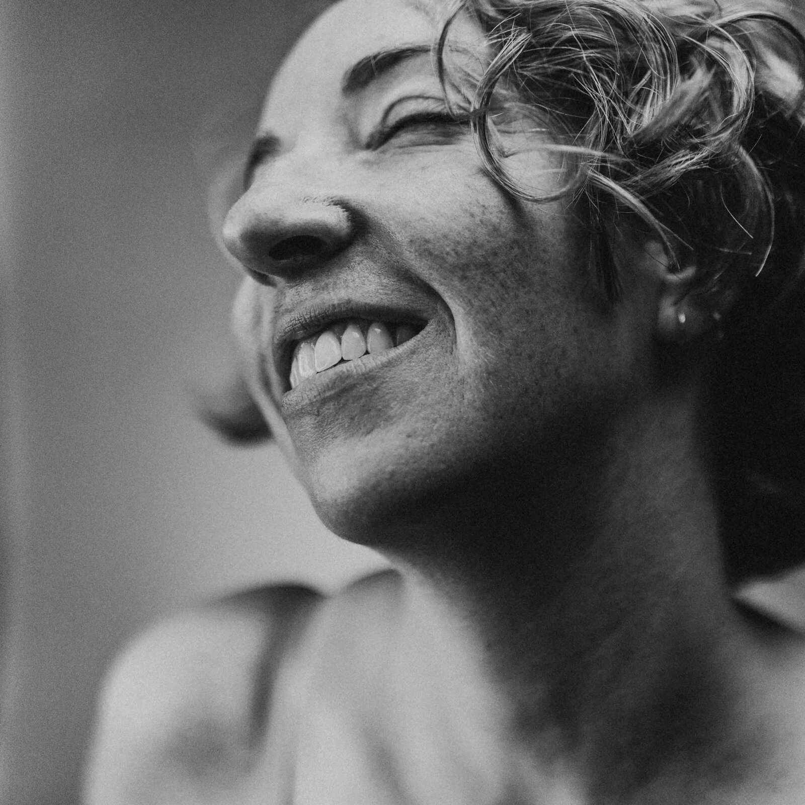 closeup photo of a smiling woman
