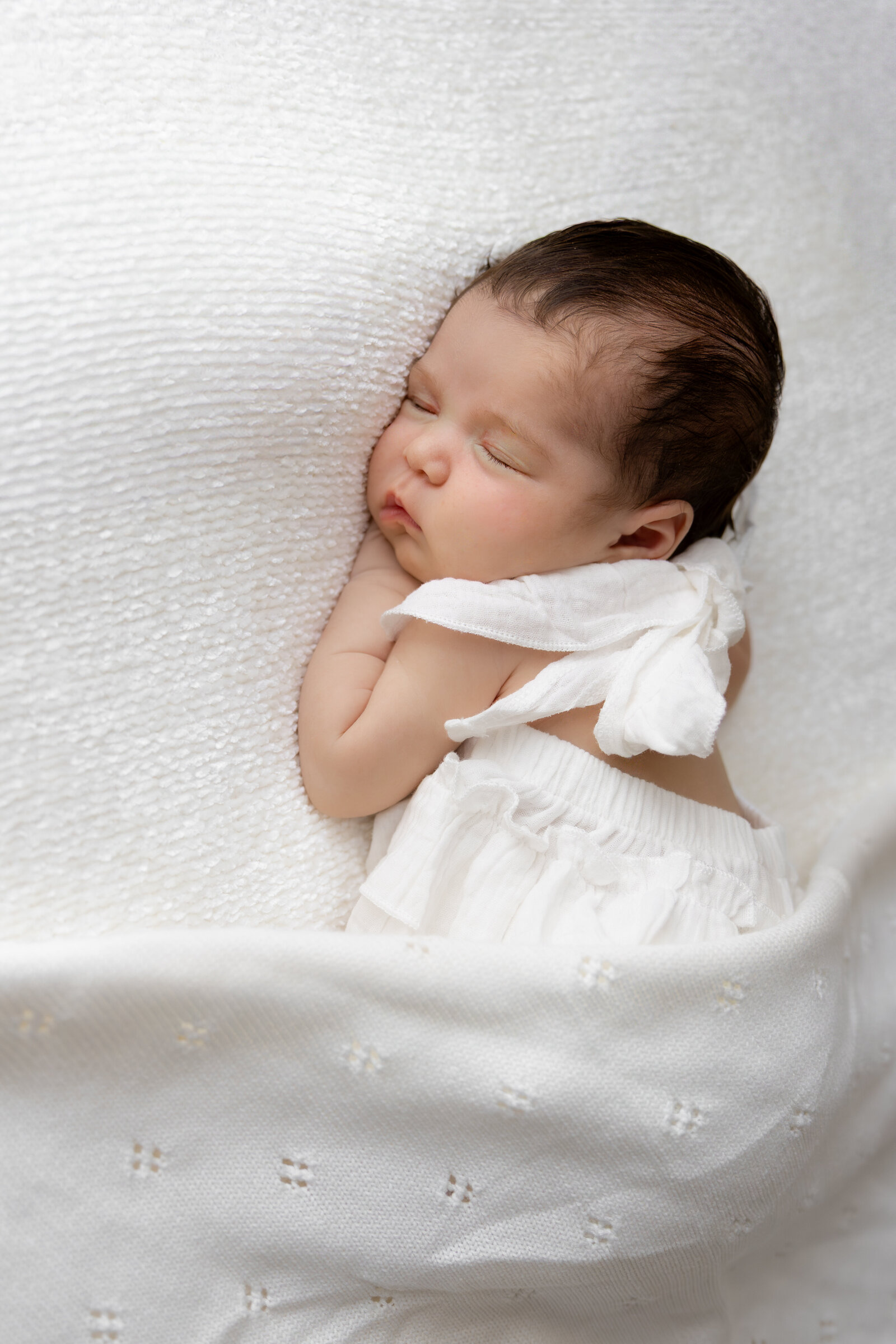 white colored outfit newborn