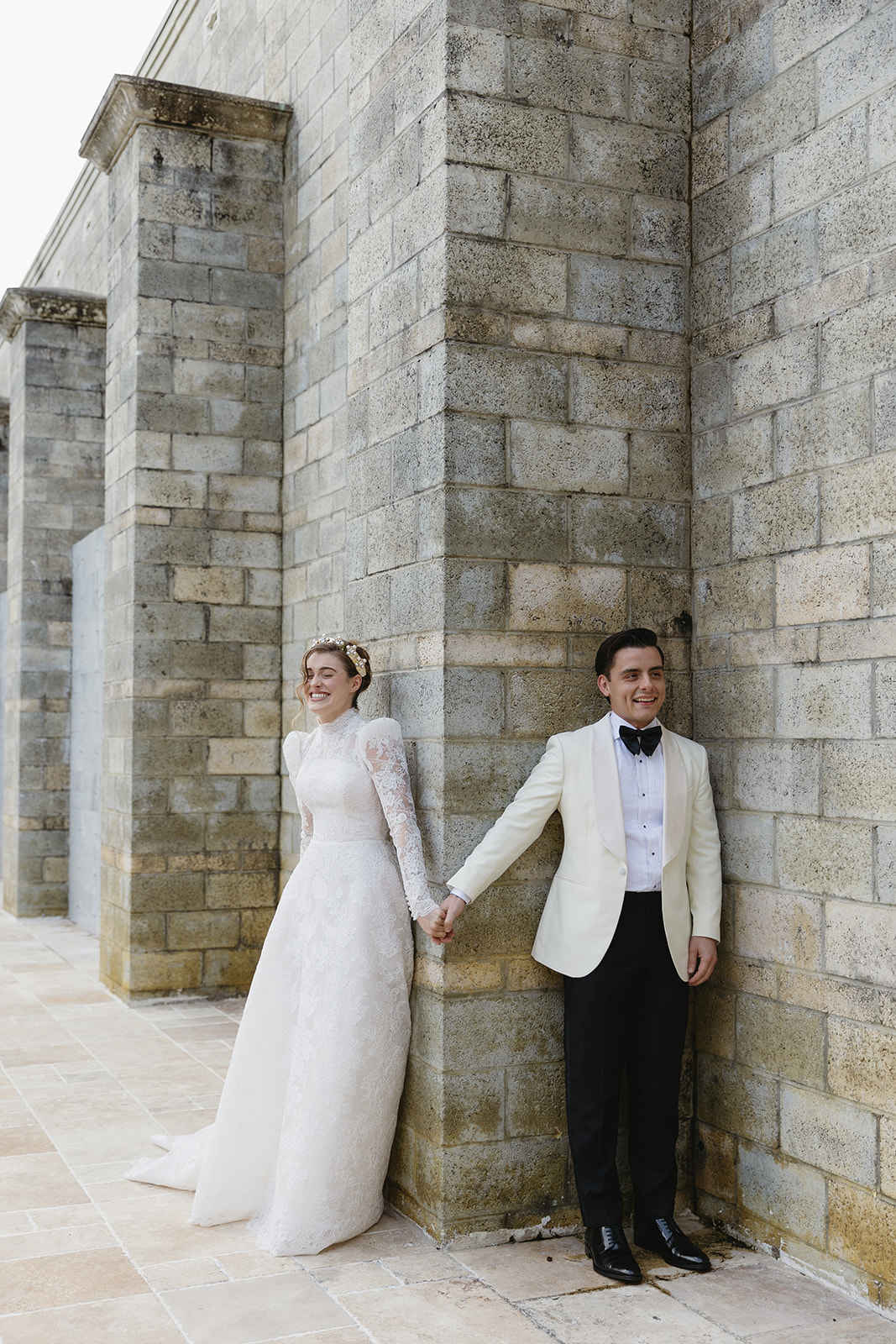 Romantic wedding photo of modest bride and groom at historical wedding venue | Sush Digital Media