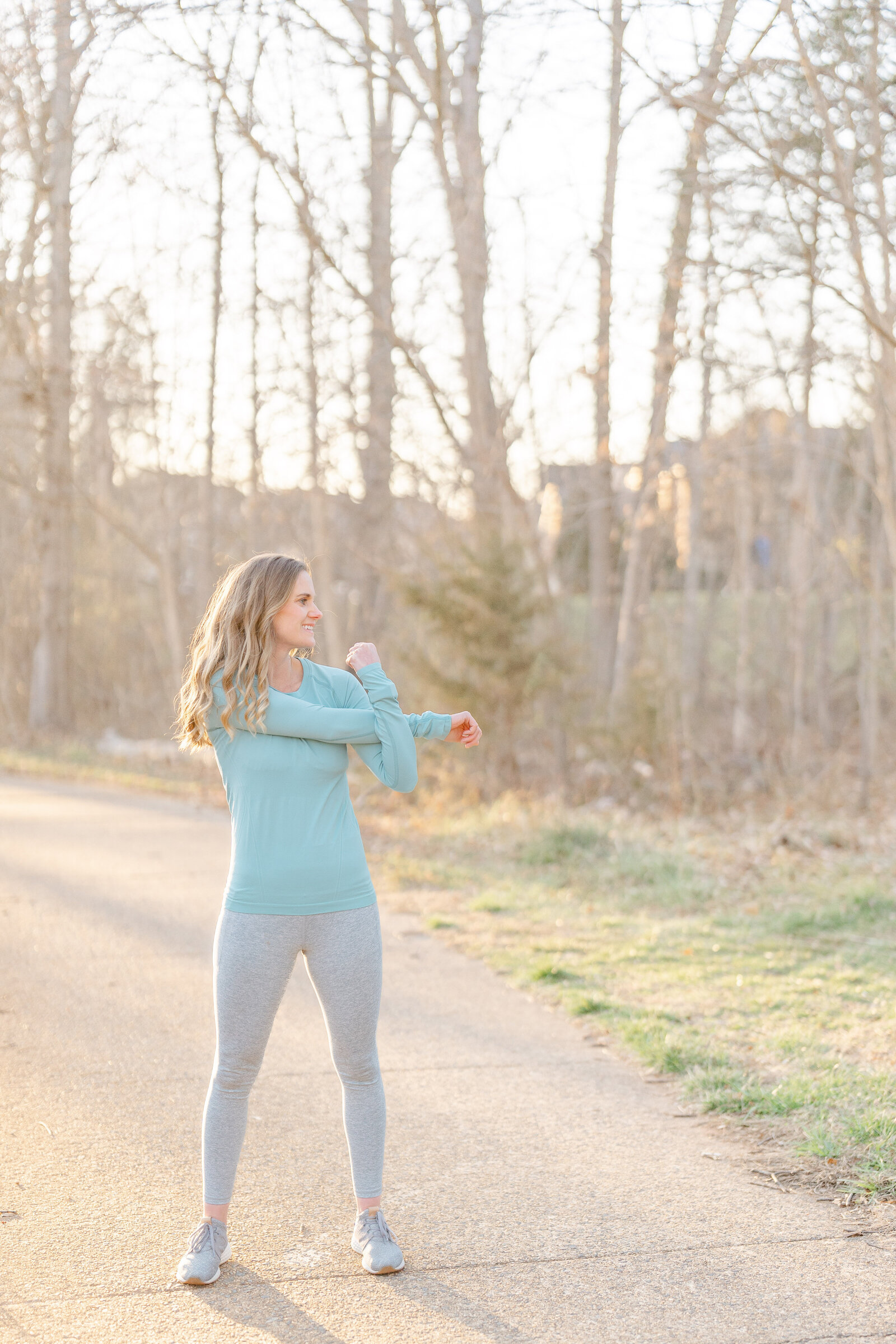 woman stretching her arm during Chantilly,VA branding photography