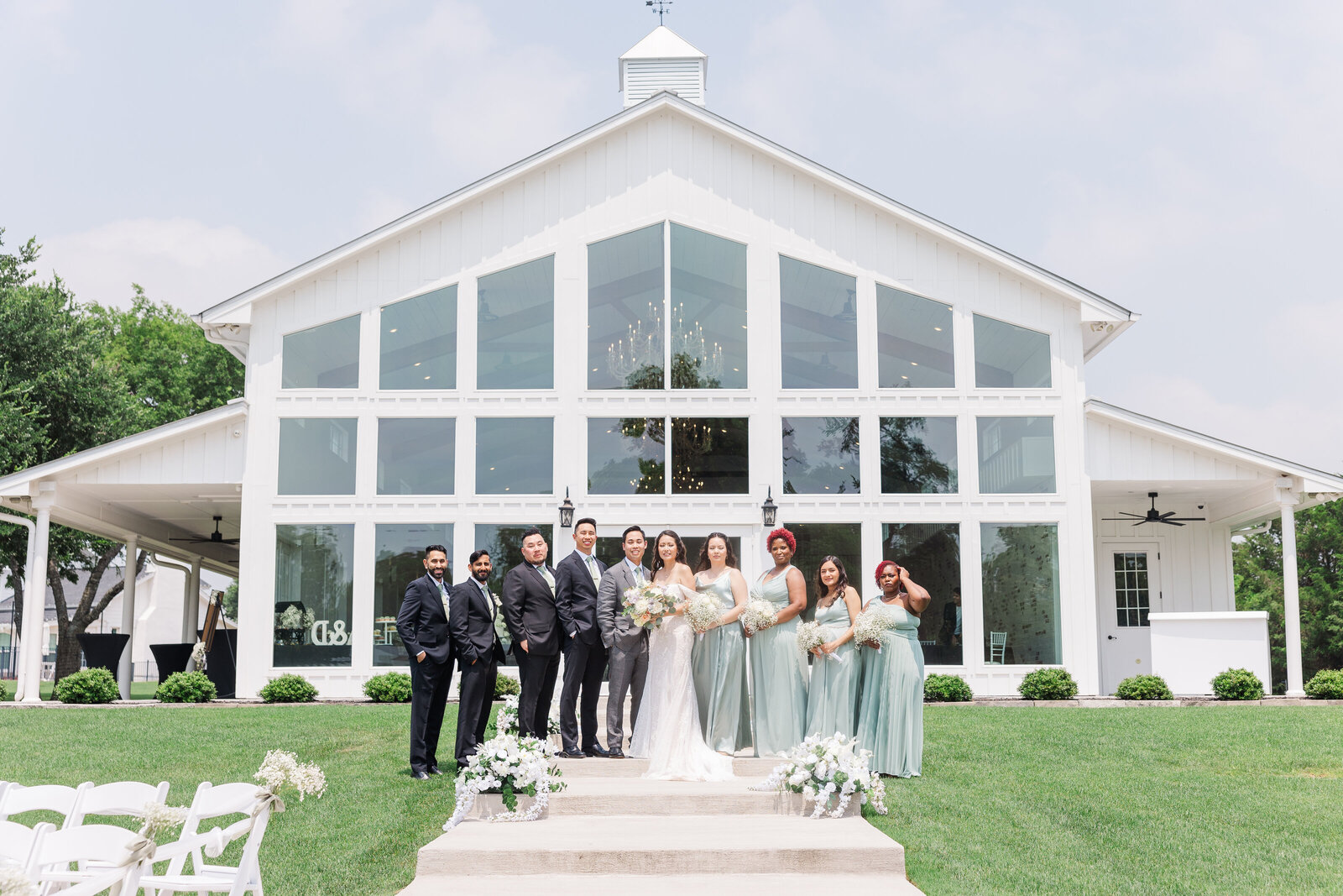 Couple and bridal party outdoor posed photoshoot