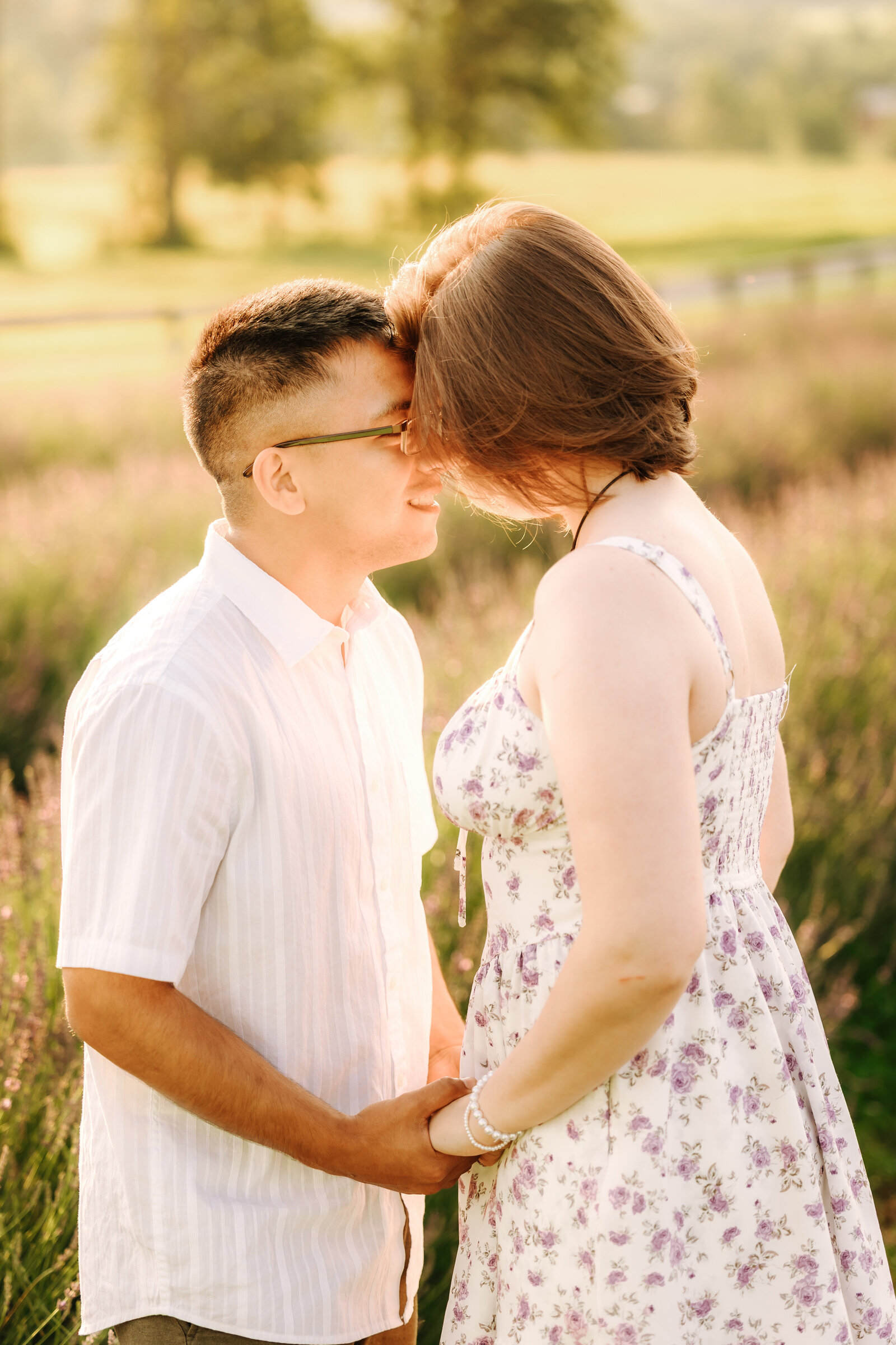 Captured by Cairns Flat Top Mountain Engagement Derrick and Breezy Josh Face to face holding hands foreheads touching