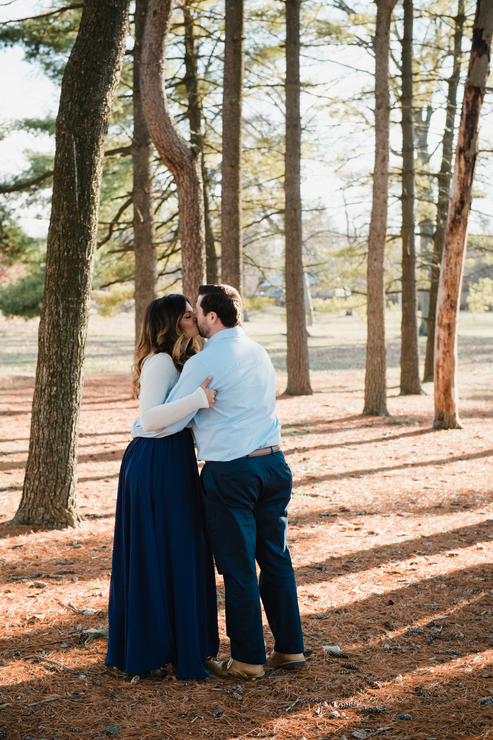 outdoor engagement photos in the trees