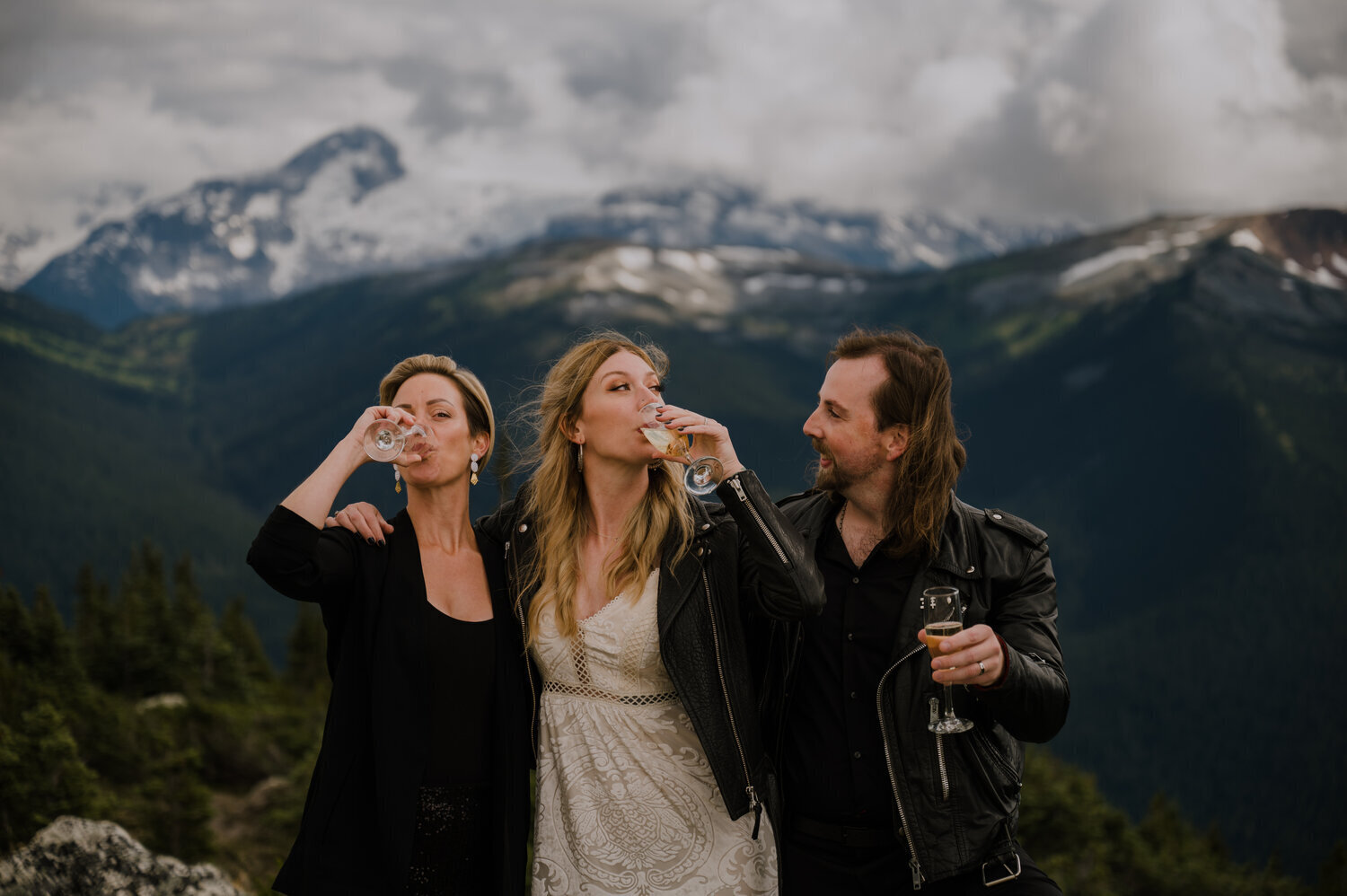 bride-and-groom-taking-a-shot-with-officiant