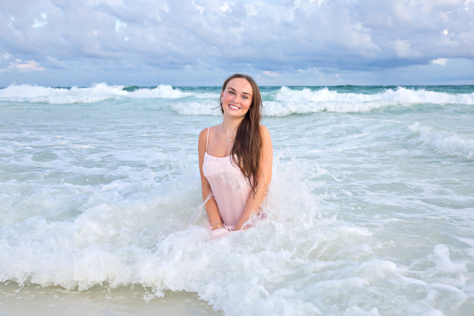 senior photograph on the beach in Seaside FL