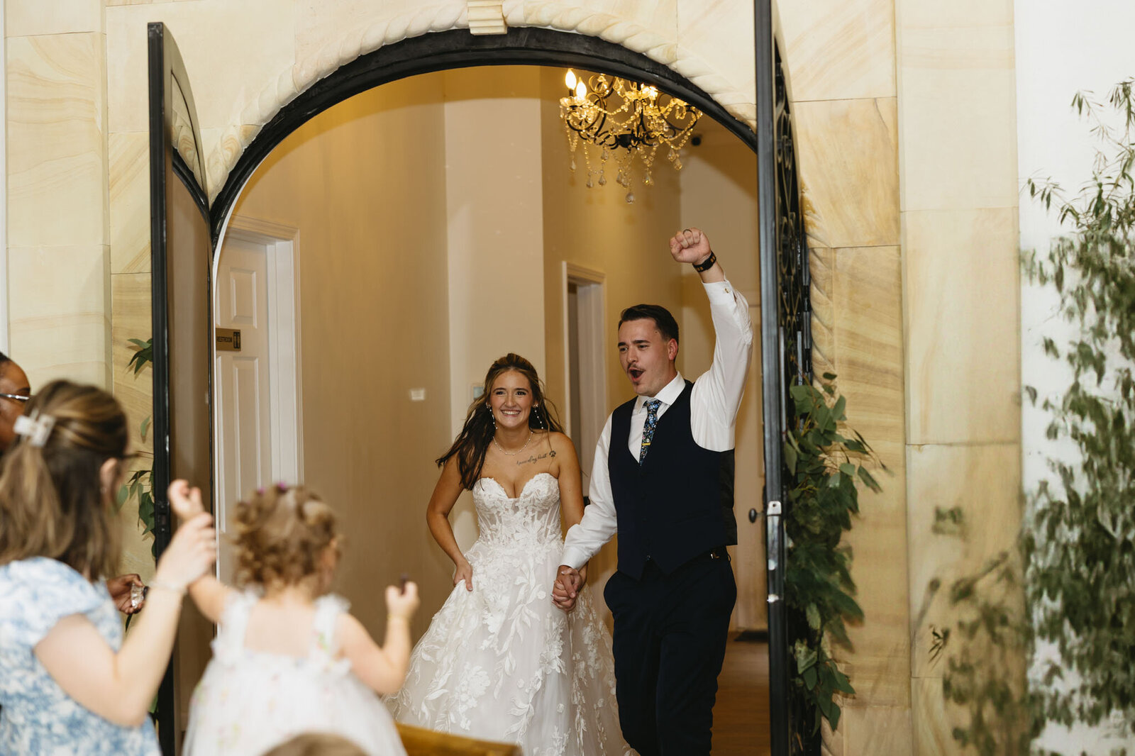 Bride and groom wedding reception entrance