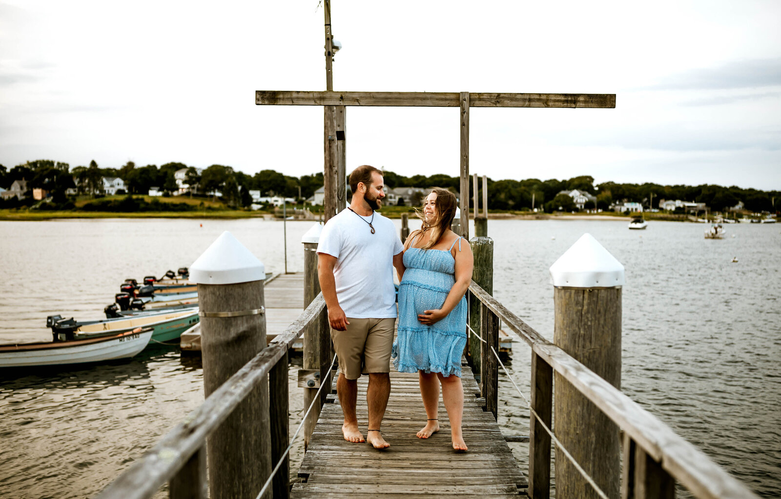 maternity photos on lake dock in worcester