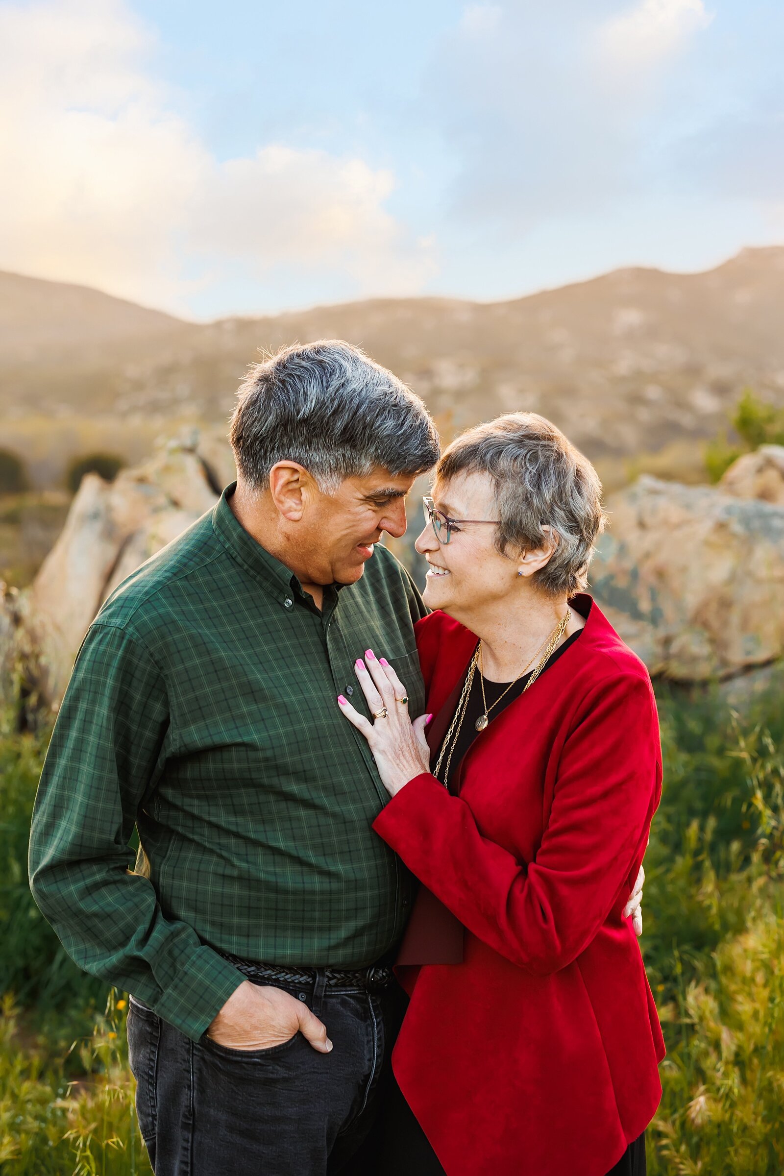 Golden Anniversary portrait taken in San Diego. Older couple looking into eachothers eyes