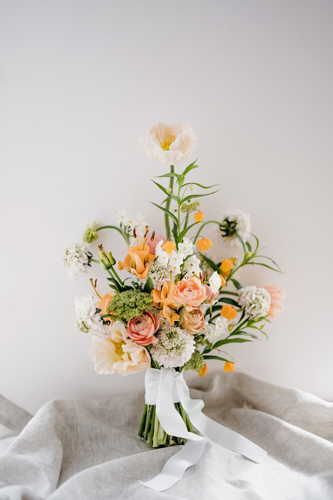Bridal bouquet of mix flowers in soft colors