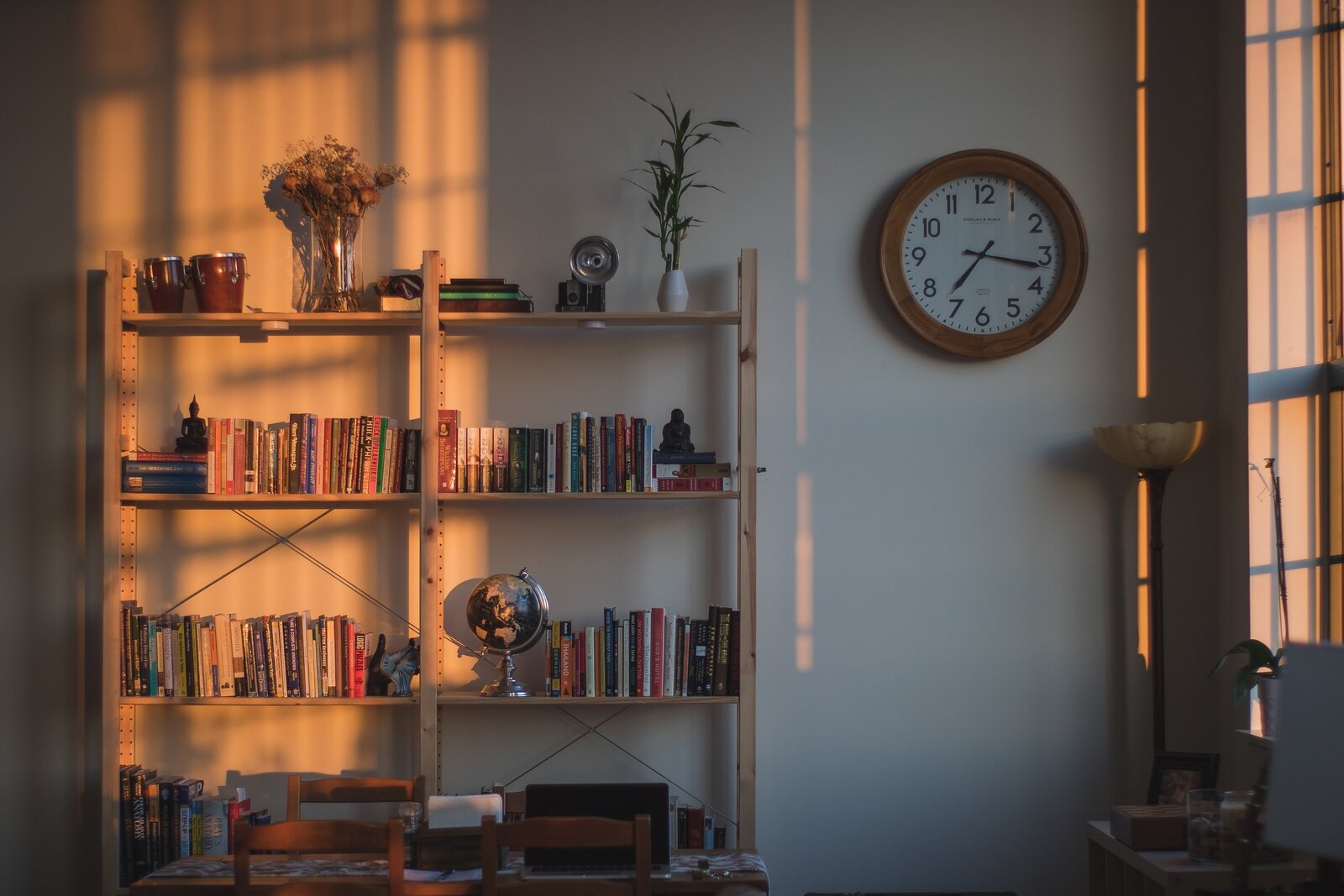 bold header for Elaborate Daydreams Designs by Meg Fisher features hands typing on a laptop with a iphone facedown