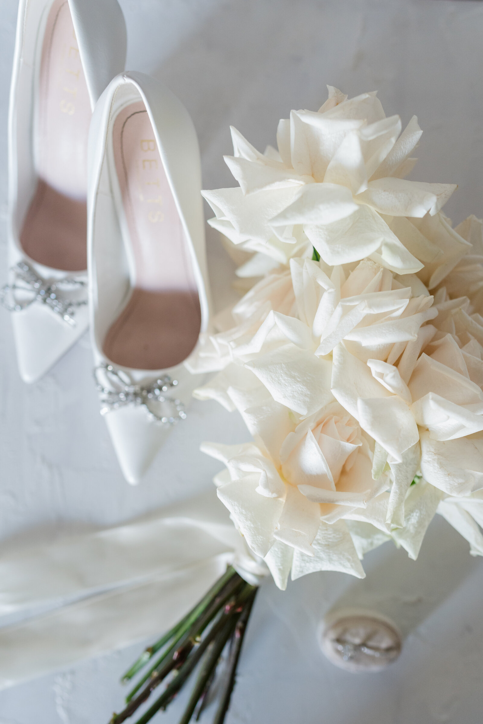 Wedding flowers and white shoes