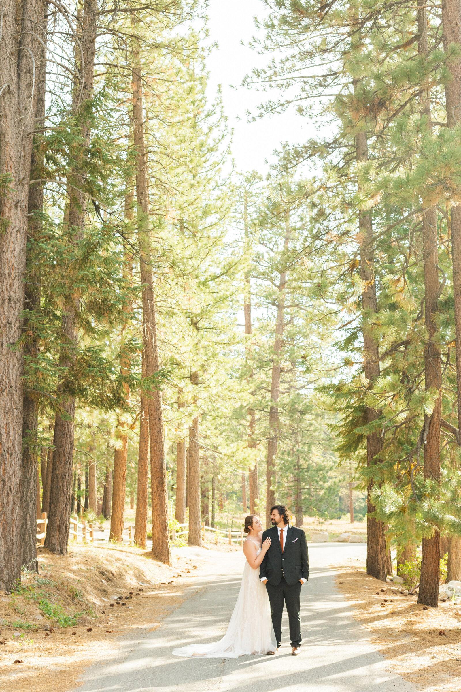 A couple celebrates their intimate elopement at a cabin at Big Bear Lake, California.